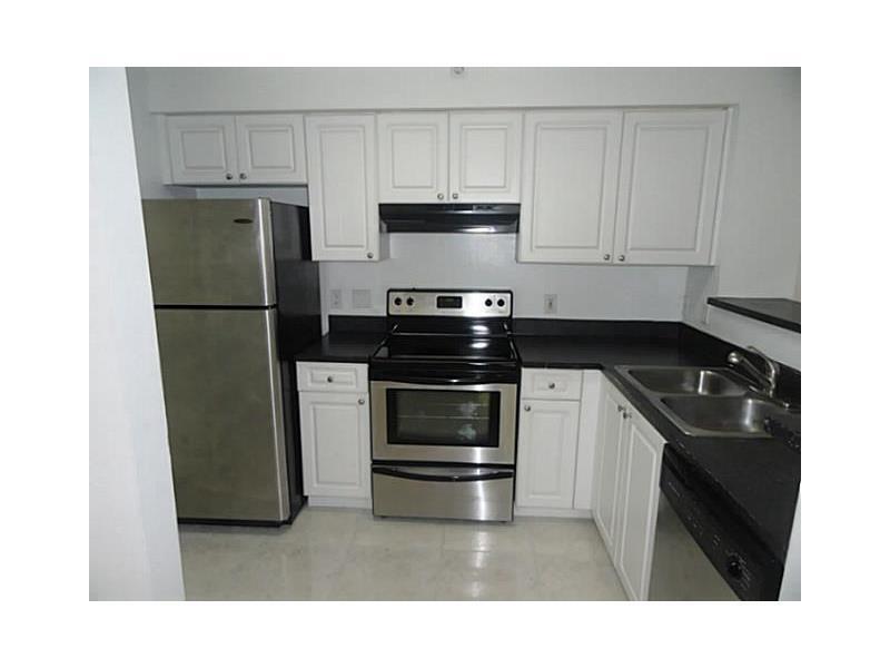 Foto de propiedad en 12166 Saint Andrews Place 111, Miramar, FL 33025 Miramar con MLS# 