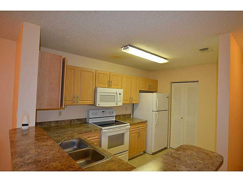 Foto de propiedad en 11255 W Atlantic Boulevard W 208, Coral Springs, FL 33071 Coral Springs con MLS# 