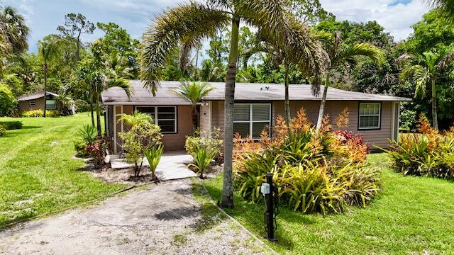 Foto de propiedad en 13559 24th Court N, Loxahatchee, FL 33470 Loxahatchee con MLS# 