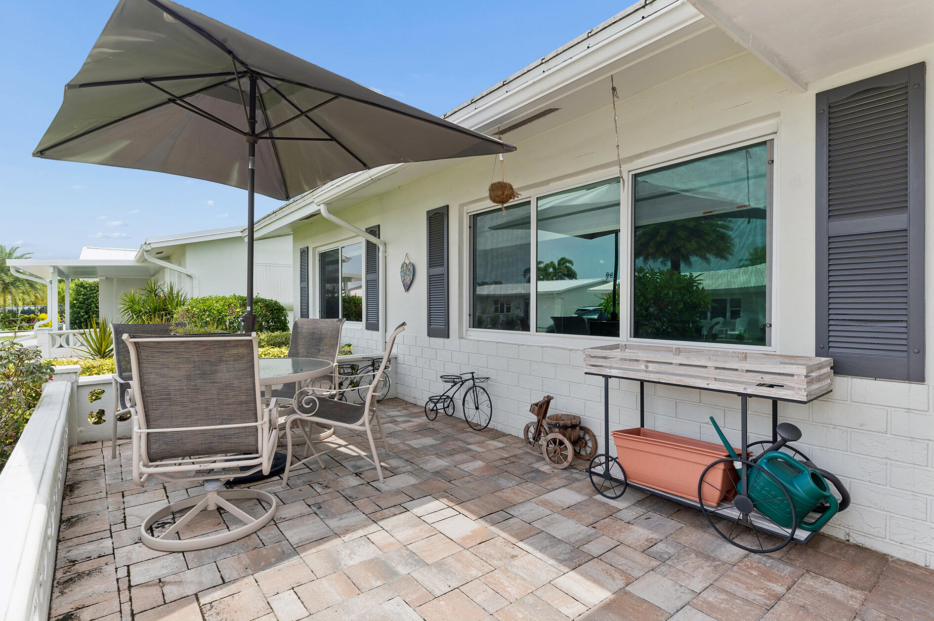 Oversized front porch with new pavers. Faces East for those gulf stream breezes.