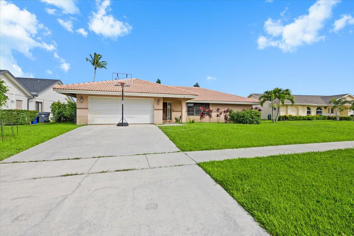 Foto de propiedad en 13482 Columbine Avenue, Wellington, FL 33414 Wellington con MLS# 