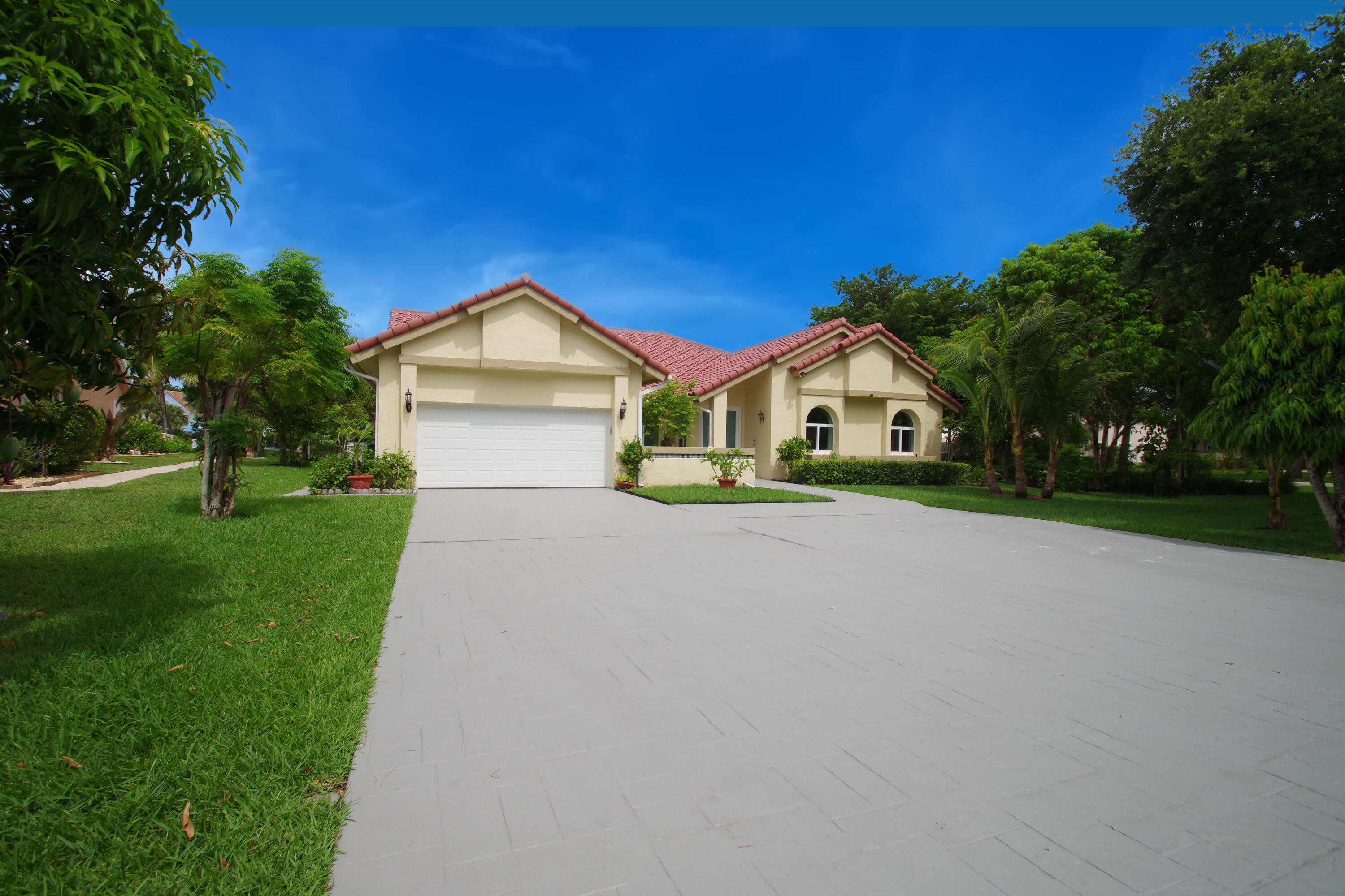 Foto de propiedad en 6300 NW 60th Way, Parkland, FL 33067 Parkland con MLS# 