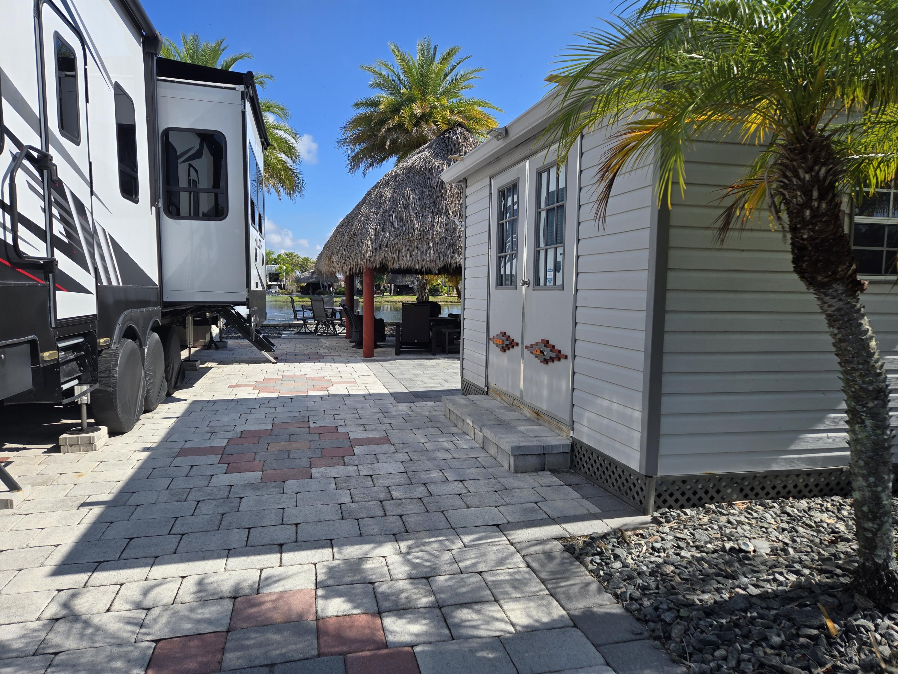 Foto de propiedad en 609 SW 42nd Cove, Okeechobee, FL 34974 Okeechobee con MLS# 