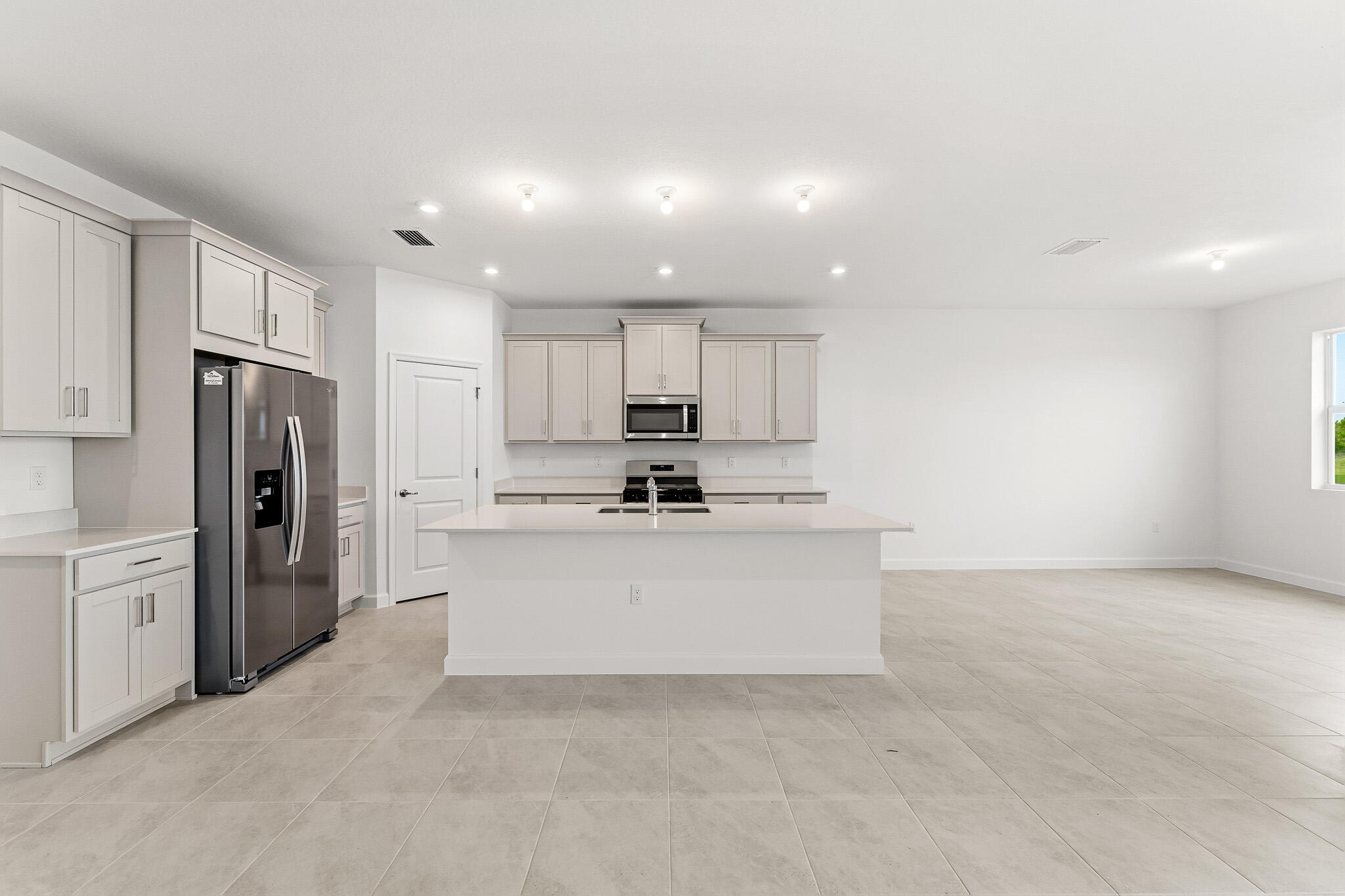 Foto de propiedad en 10849 SW Orana Drive, Port St. Lucie, FL 34987 Port St. Lucie con MLS# 
