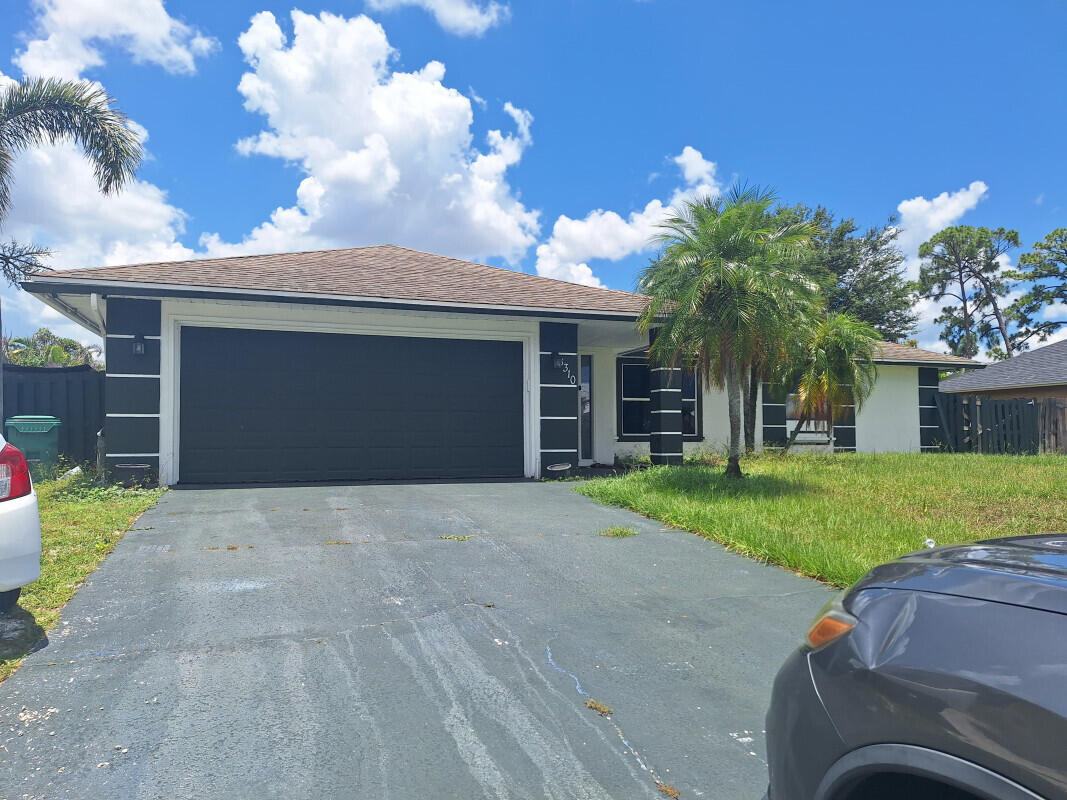 Foto de propiedad en 3310 SW Martin Street, Port St. Lucie, FL 34953 Port St. Lucie con MLS# 
