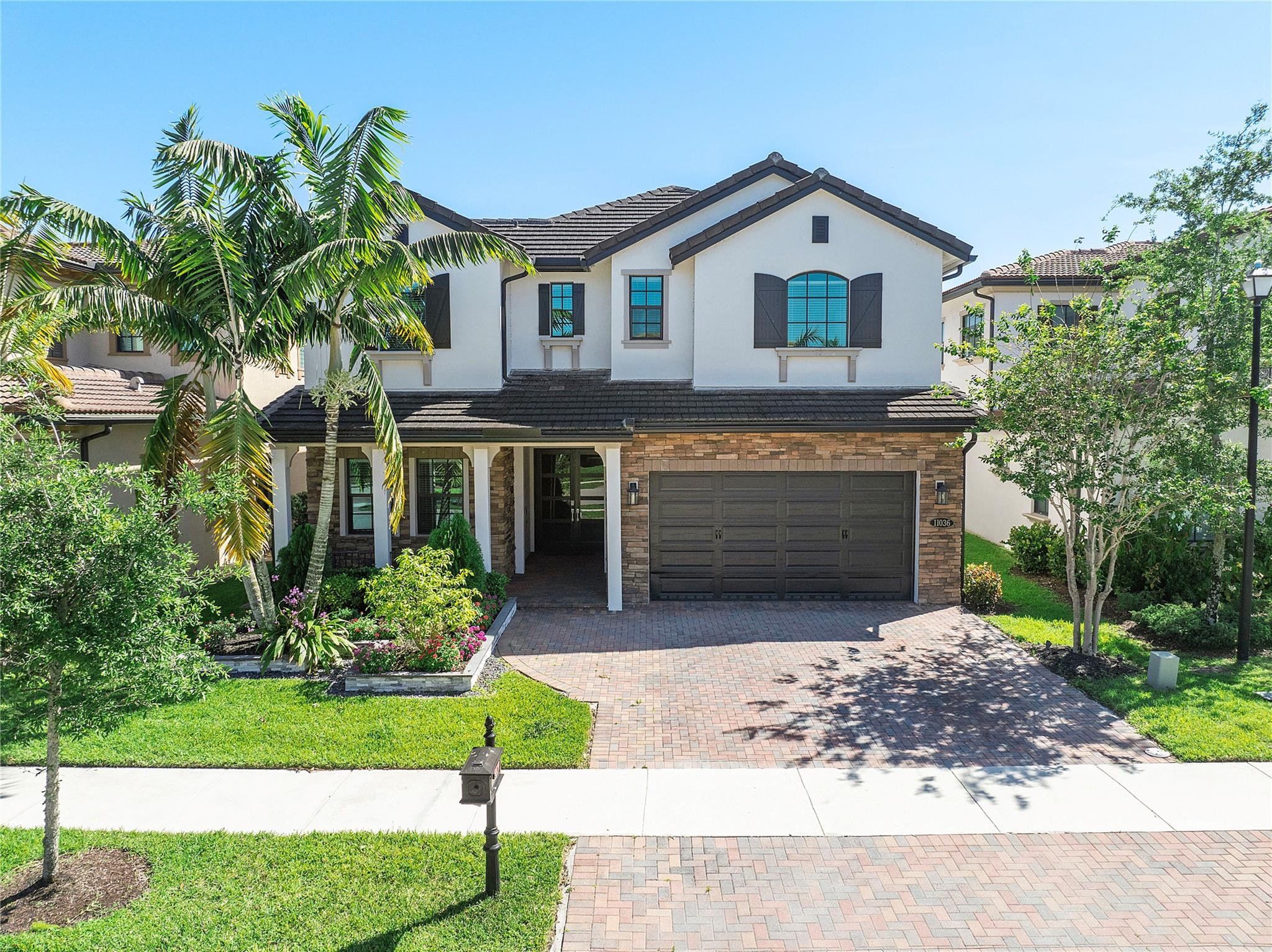Foto de propiedad en 11036 Meridian Drive N, Parkland, FL 33076 Parkland con MLS# 