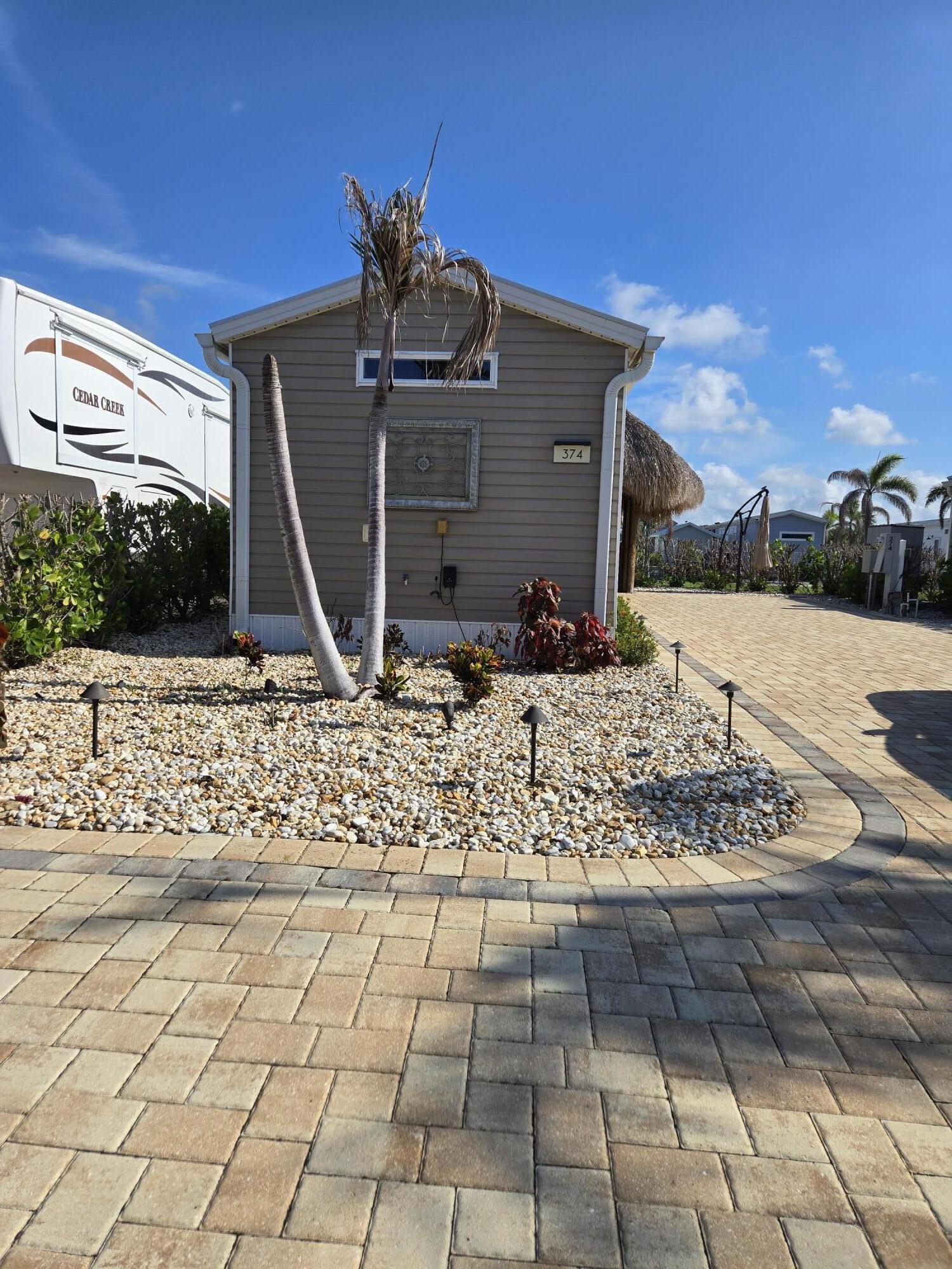 Foto de propiedad en 639 34th Trace SW, Okeechobee, FL 34974 Okeechobee con MLS# 