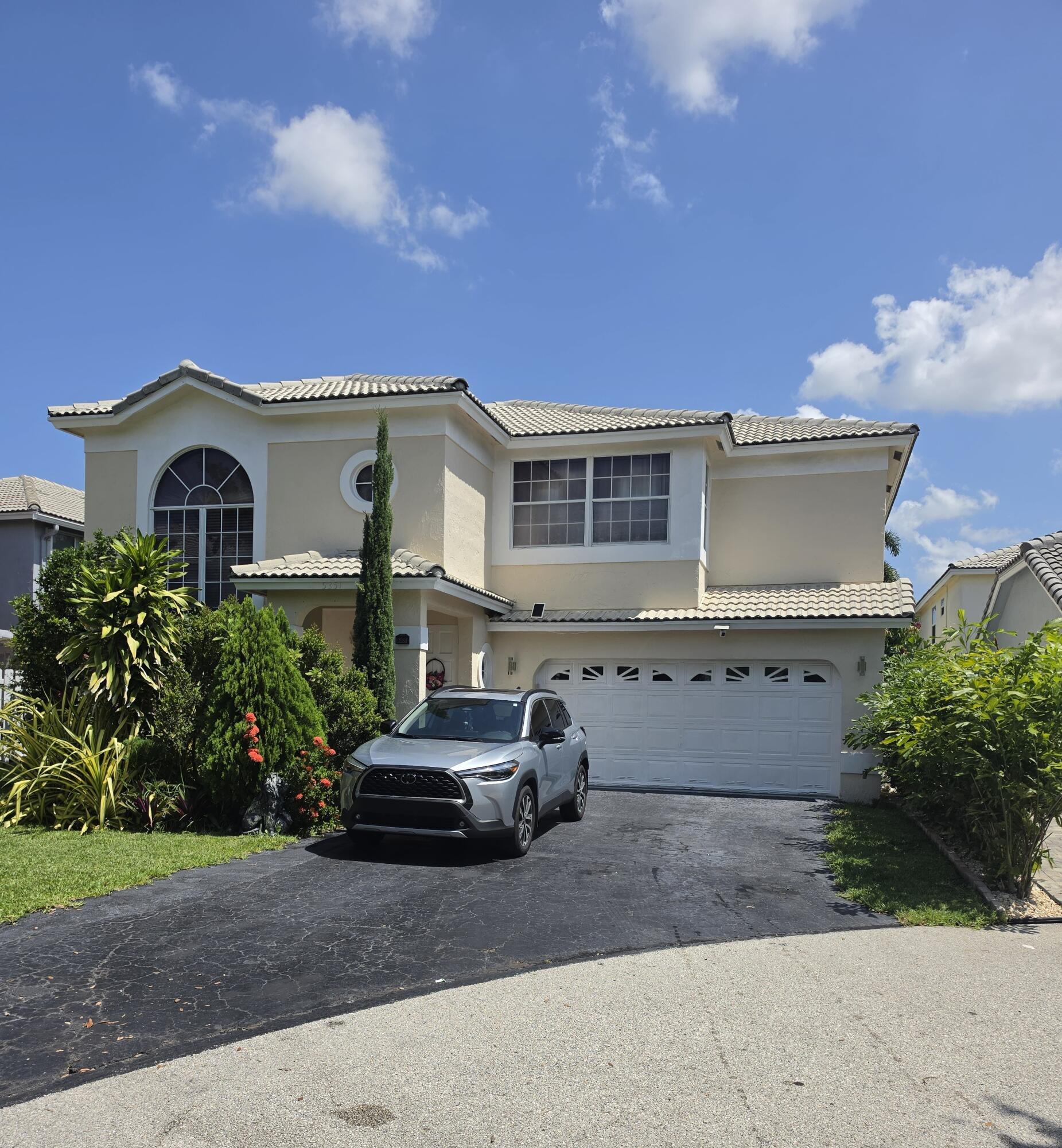Foto de propiedad en 5351 NW 41st Way, Coconut Creek, FL 33073 Coconut Creek con MLS# 