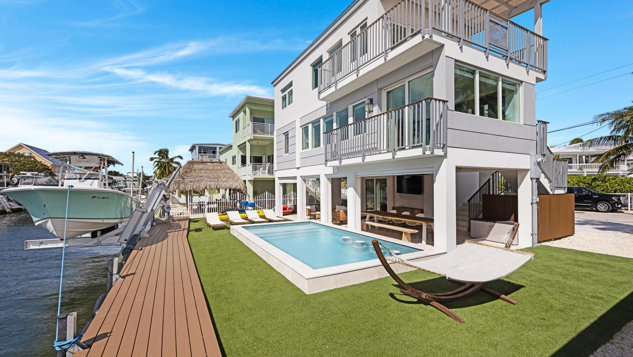 Foto de propiedad en 704 Grouper Lane, Key Largo, FL 33037 Key Largo con MLS# 