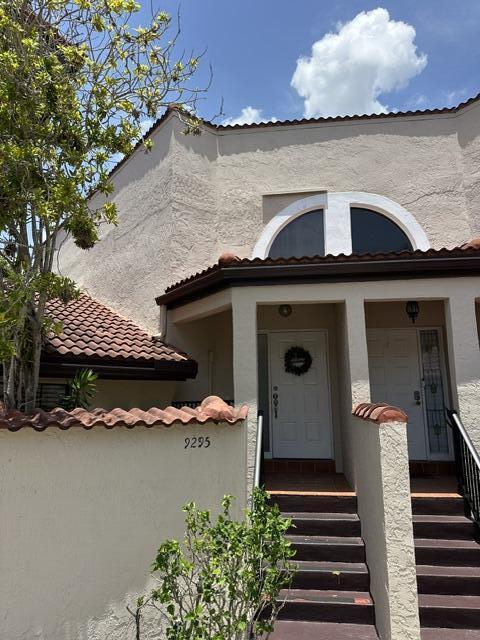 Foto de propiedad en 9295 W Sunrise Boulevard 9295, Plantation, FL 33322 Plantation con MLS# 