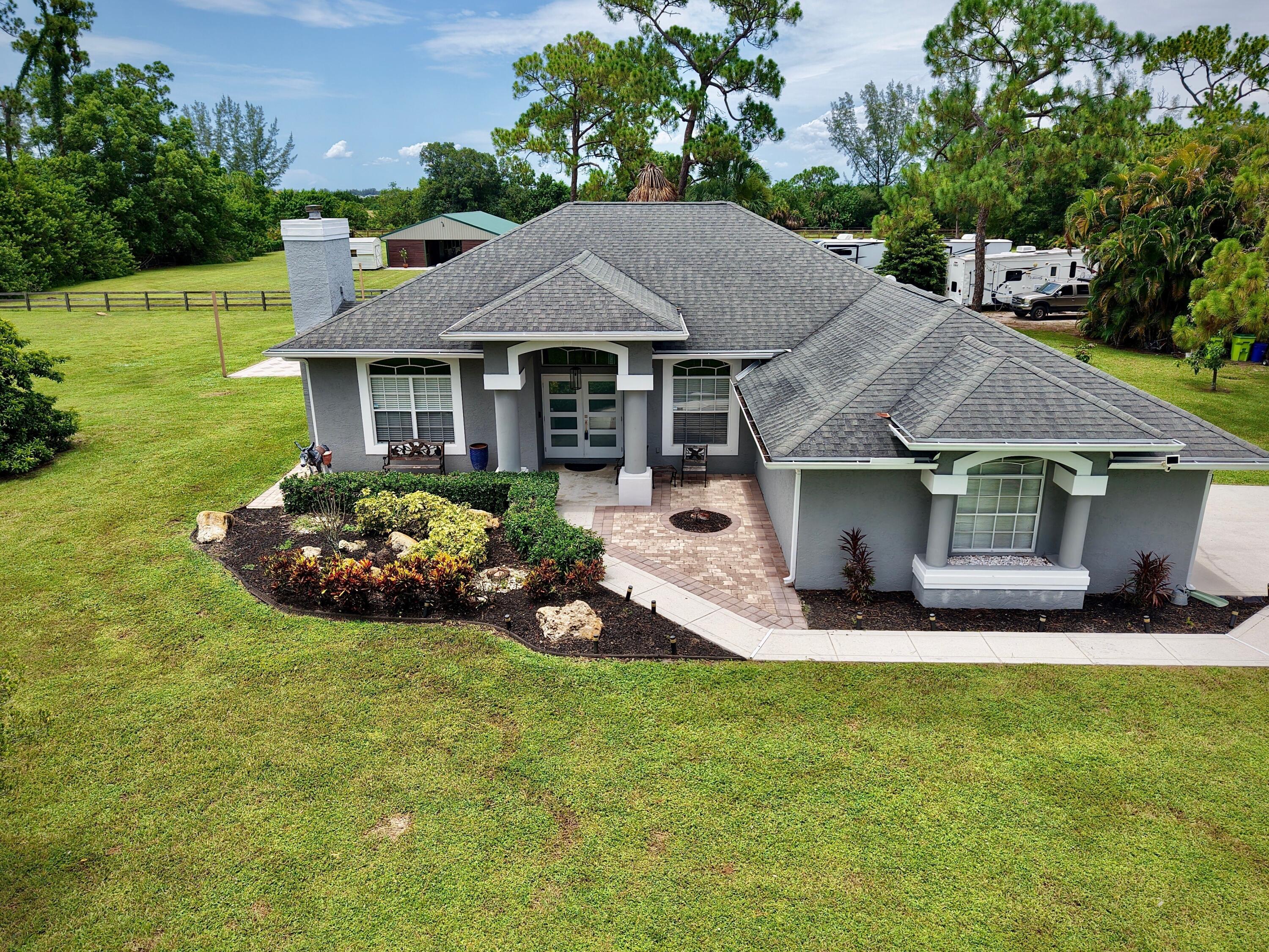 Foto de propiedad en 14279 43rd Road N, Loxahatchee Groves, FL 33470 Loxahatchee Groves con MLS# 