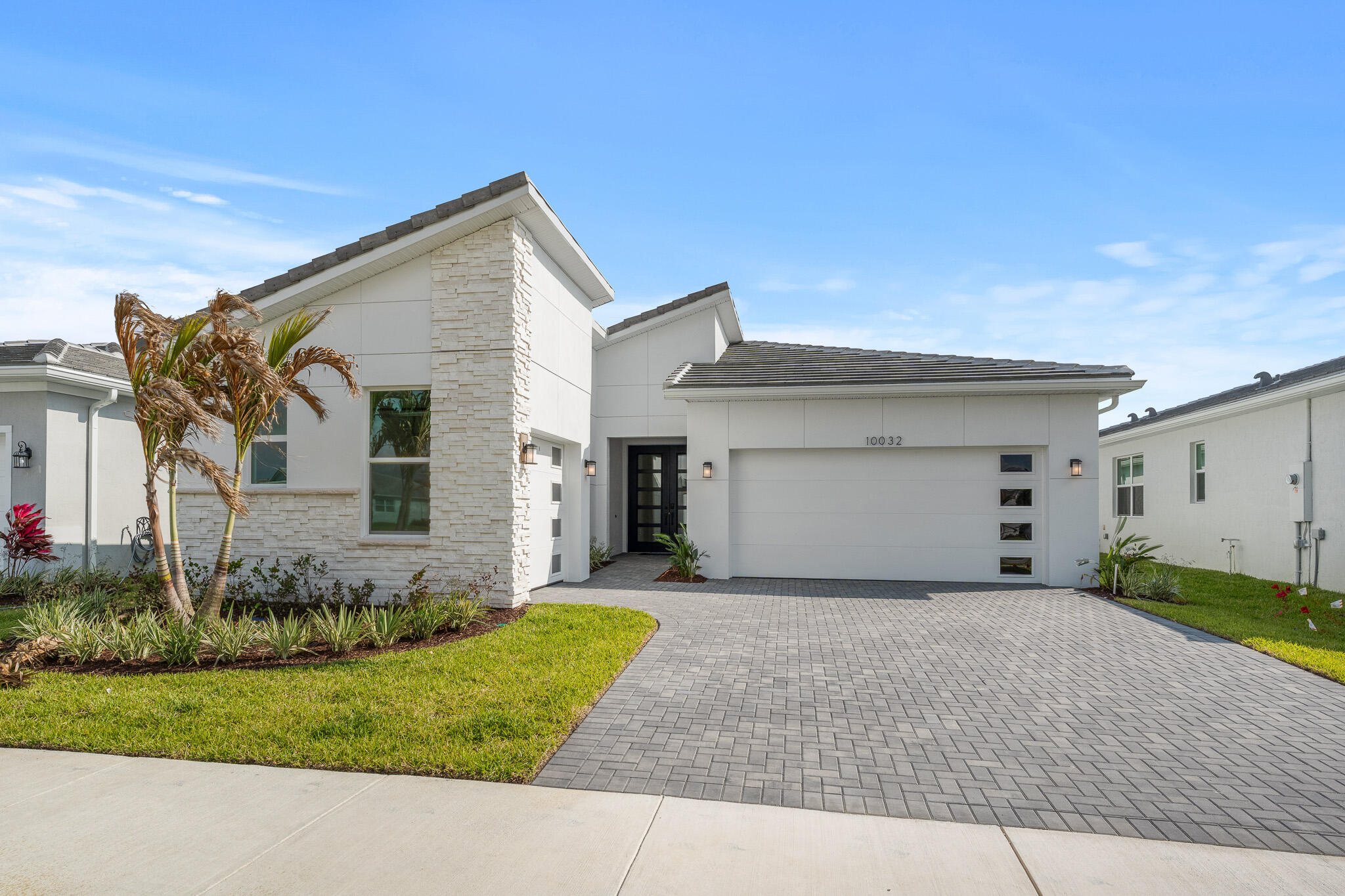 Foto de propiedad en 11968 SW Pantone Street, Port St. Lucie, FL 34987 Port St. Lucie con MLS# 