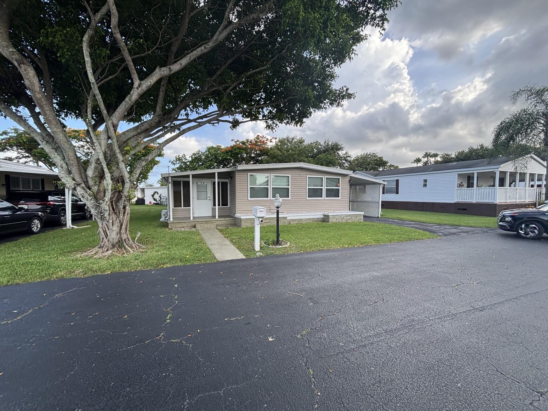 Foto de propiedad en 4530 NW 68th Court, Coconut Creek, FL 33073 Coconut Creek con MLS# 