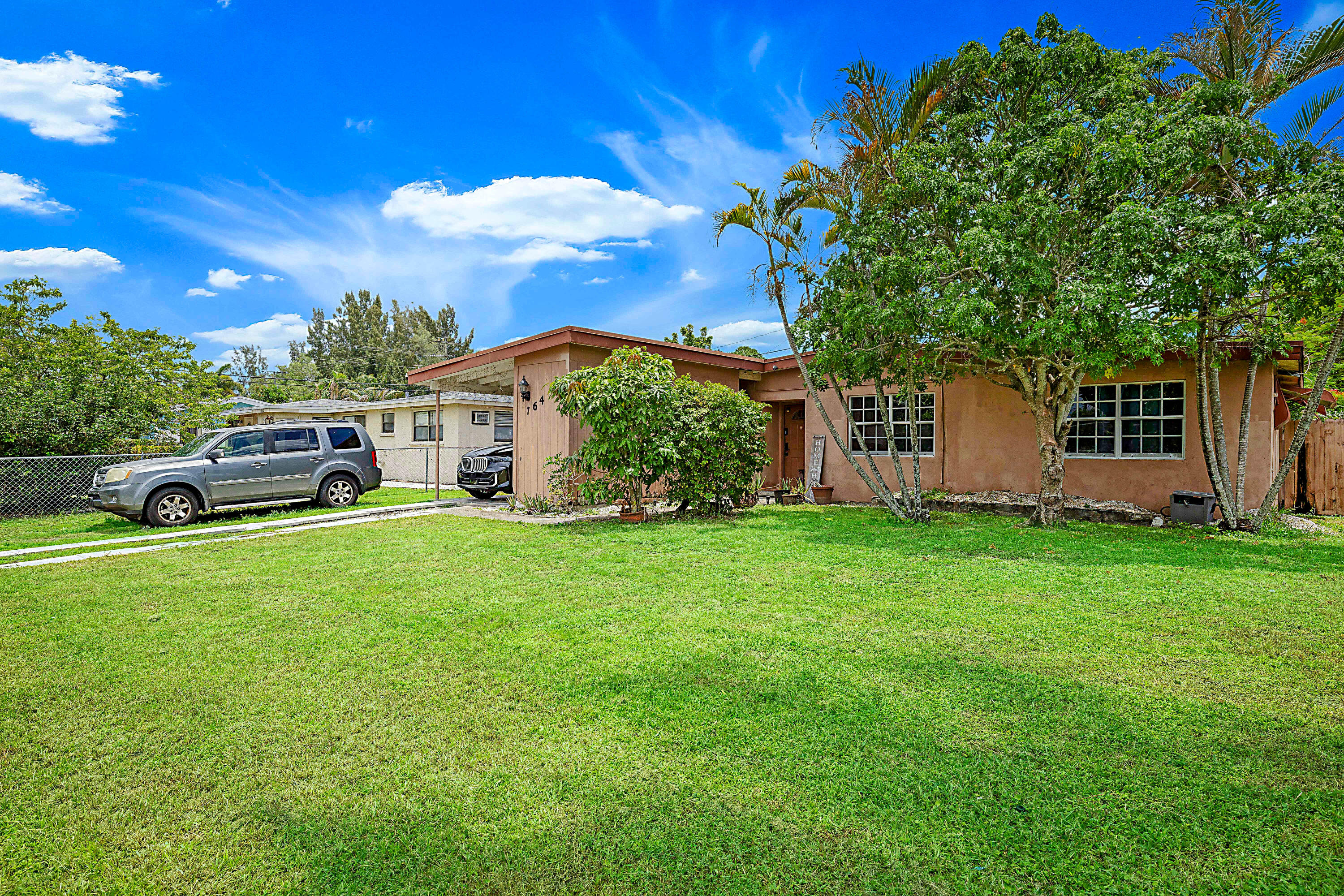 Foto de propiedad en 764 Camellia Drive, Royal Palm Beach, FL 33411 Royal Palm Beach con MLS# 