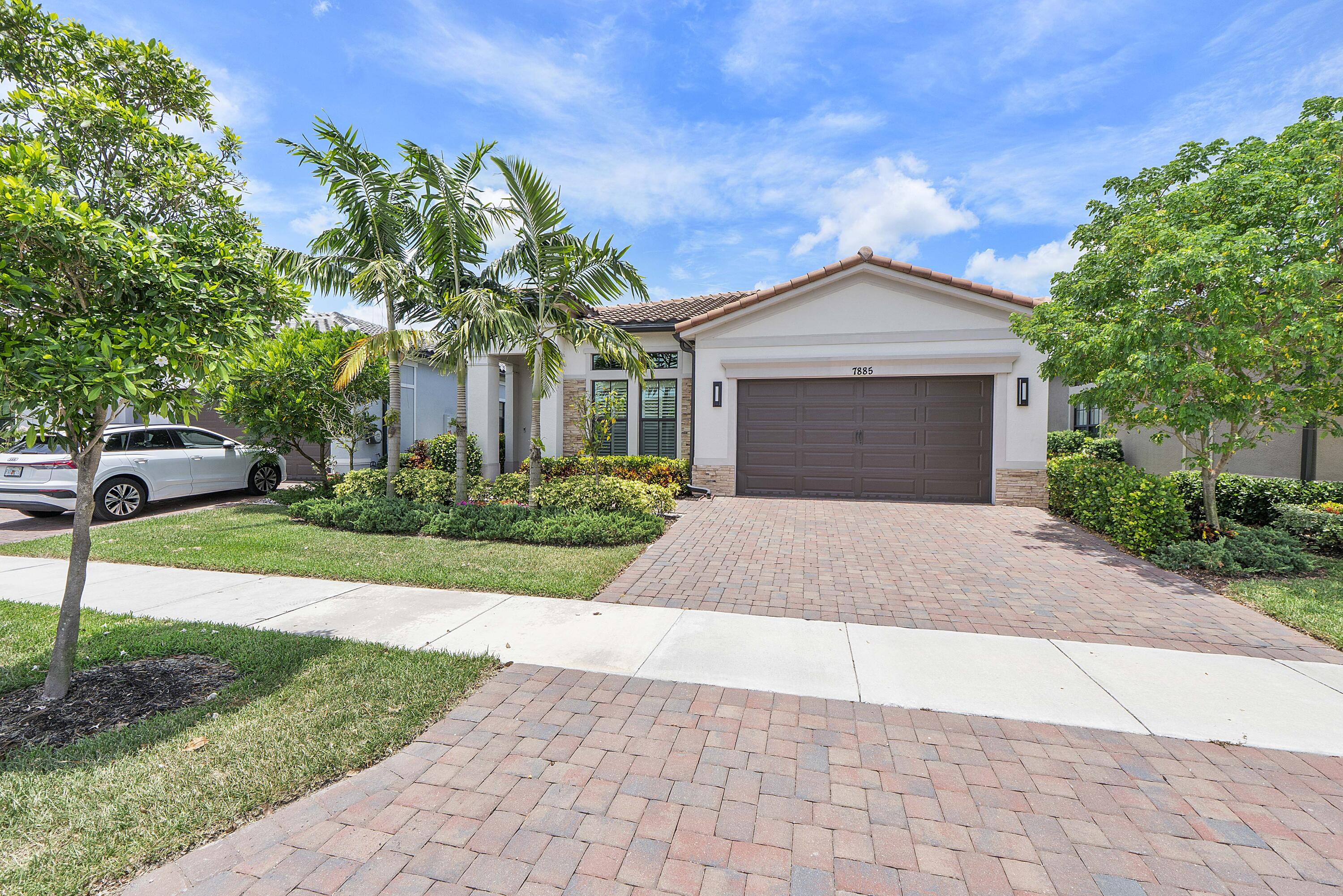Foto de propiedad en 7885 Ironwood Way, Parkland, FL 33067 Parkland con MLS# 