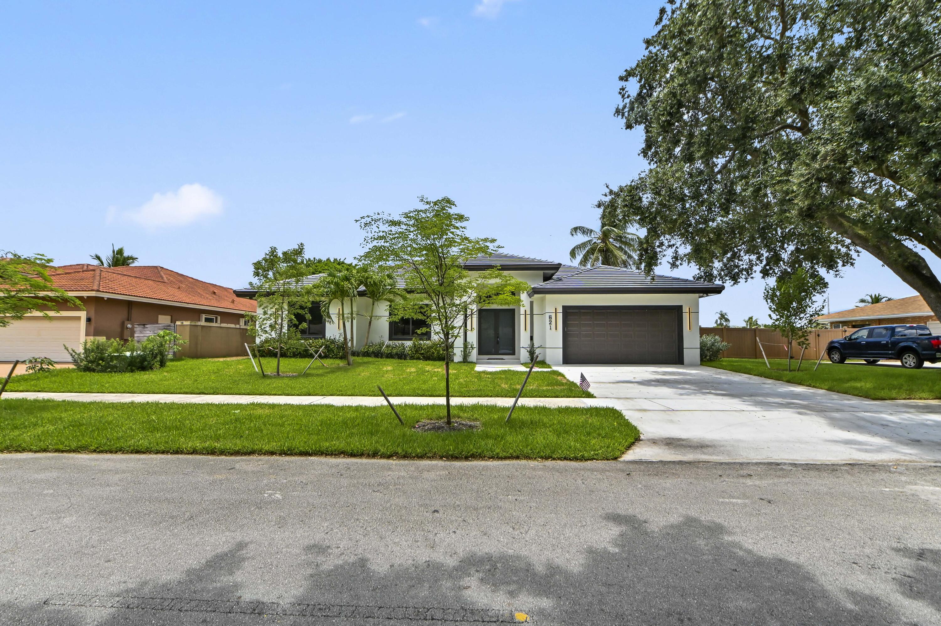 Foto de propiedad en 621 NW 42nd Avenue, Coconut Creek, FL 33066 Coconut Creek con MLS# 