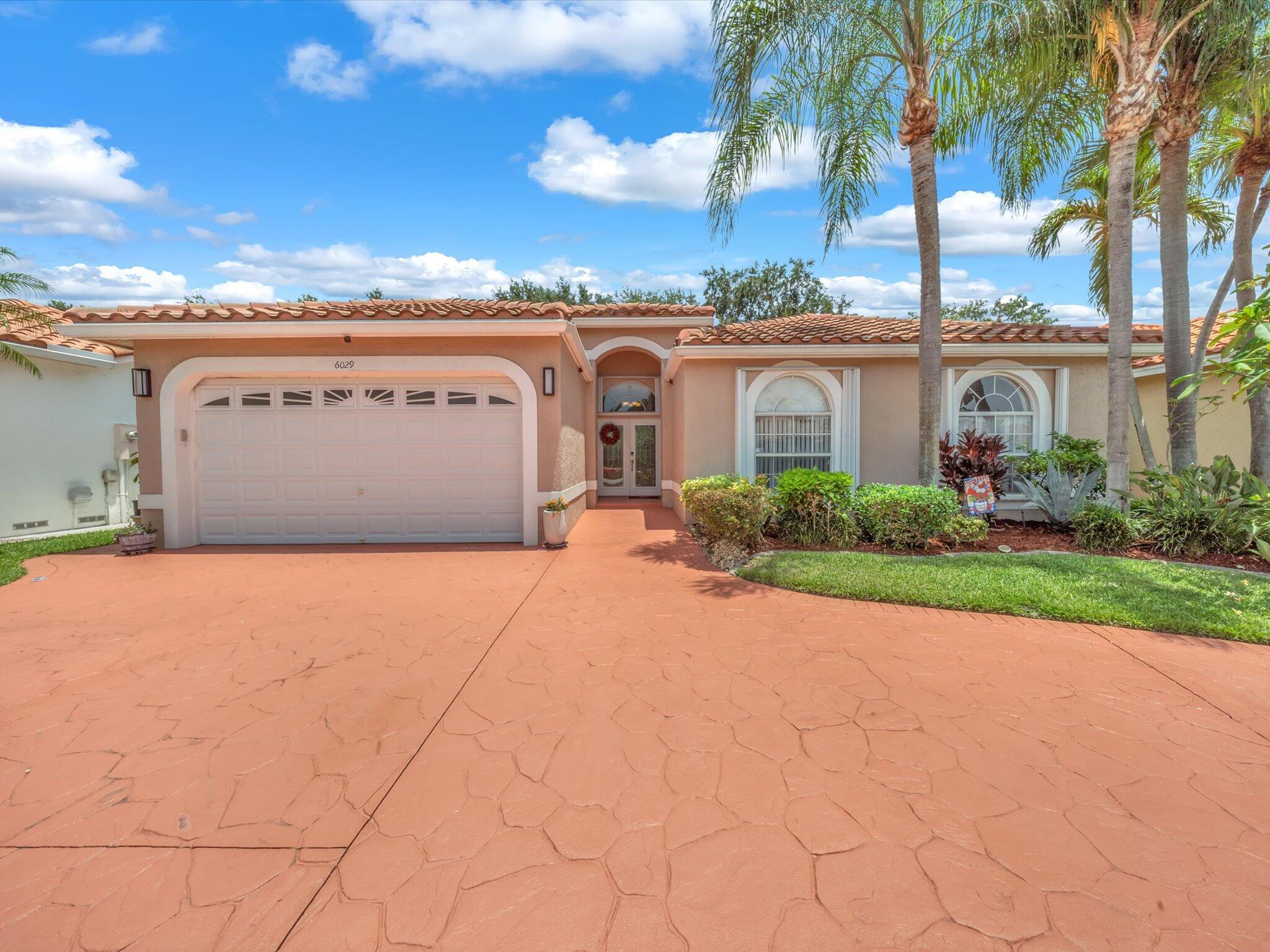 Foto de propiedad en 6029 NW 74th Street, Parkland, FL 33067 Parkland con MLS# 