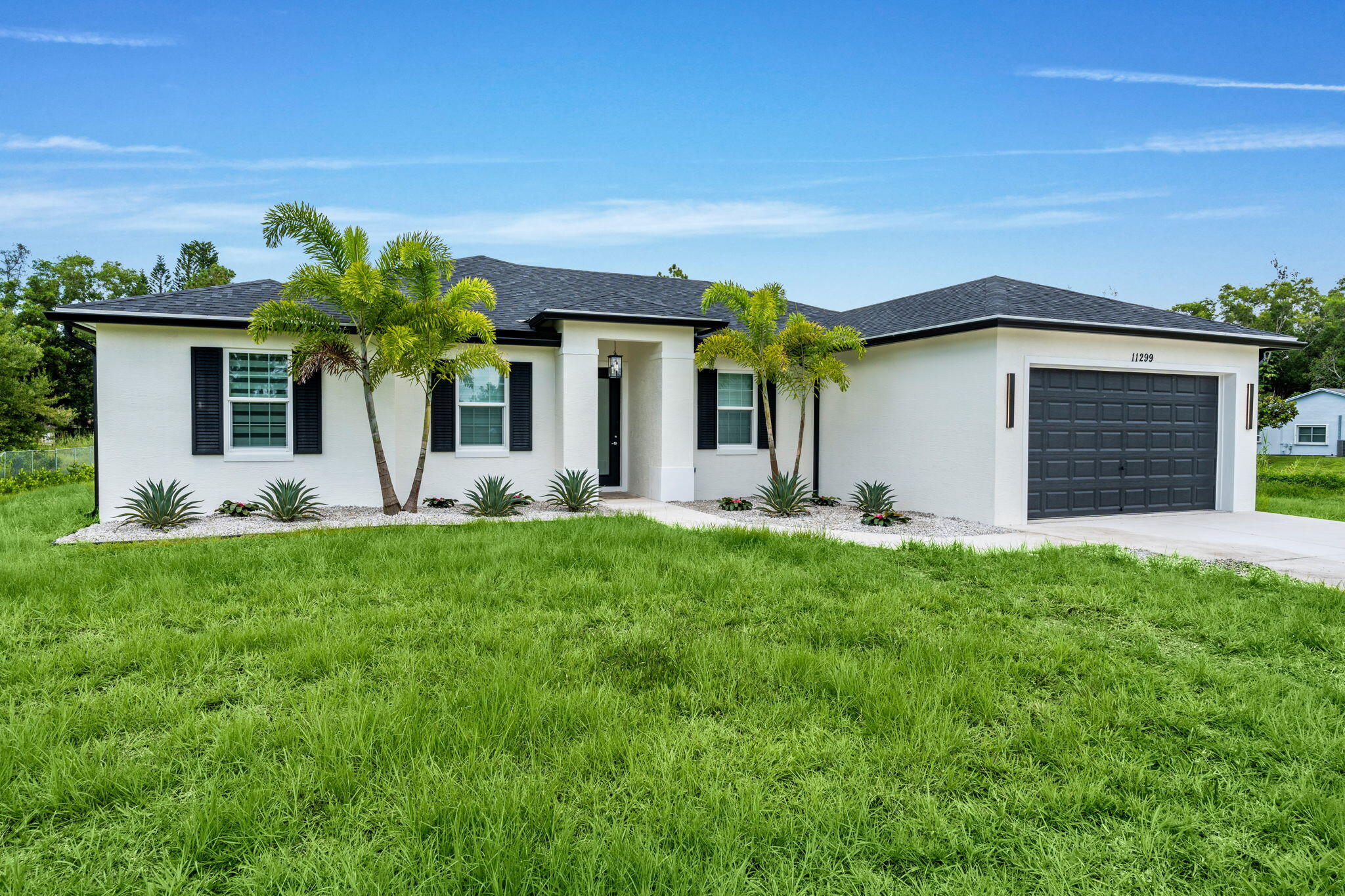 Foto de propiedad en 11299 42nd Road N, Royal Palm Beach, FL 33411 Royal Palm Beach con MLS# 