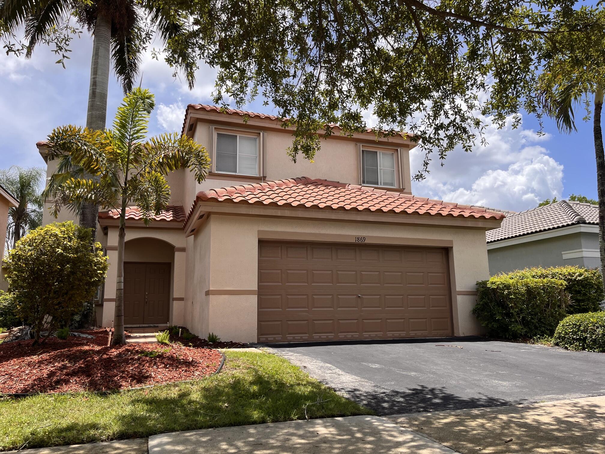 Foto de propiedad en 1869 Aspen Lane, Weston, FL 33327 Weston con MLS# 