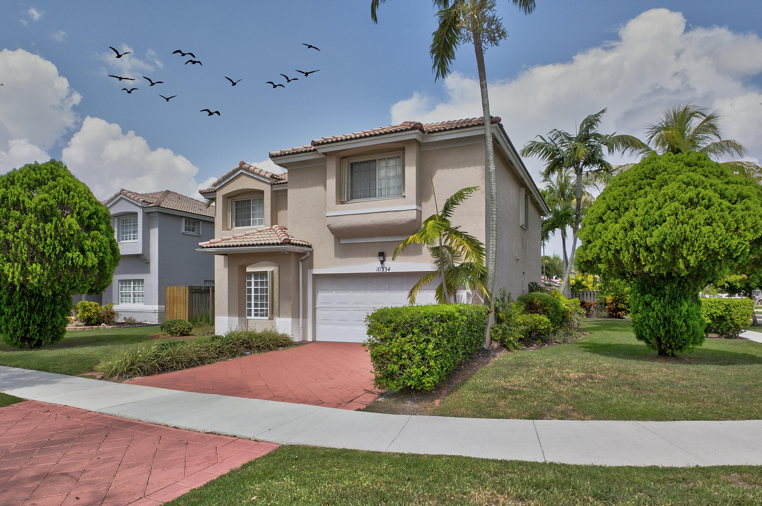 Foto de propiedad en 10334 SW 164th Place, Miami, FL 33196 Miami con MLS# 