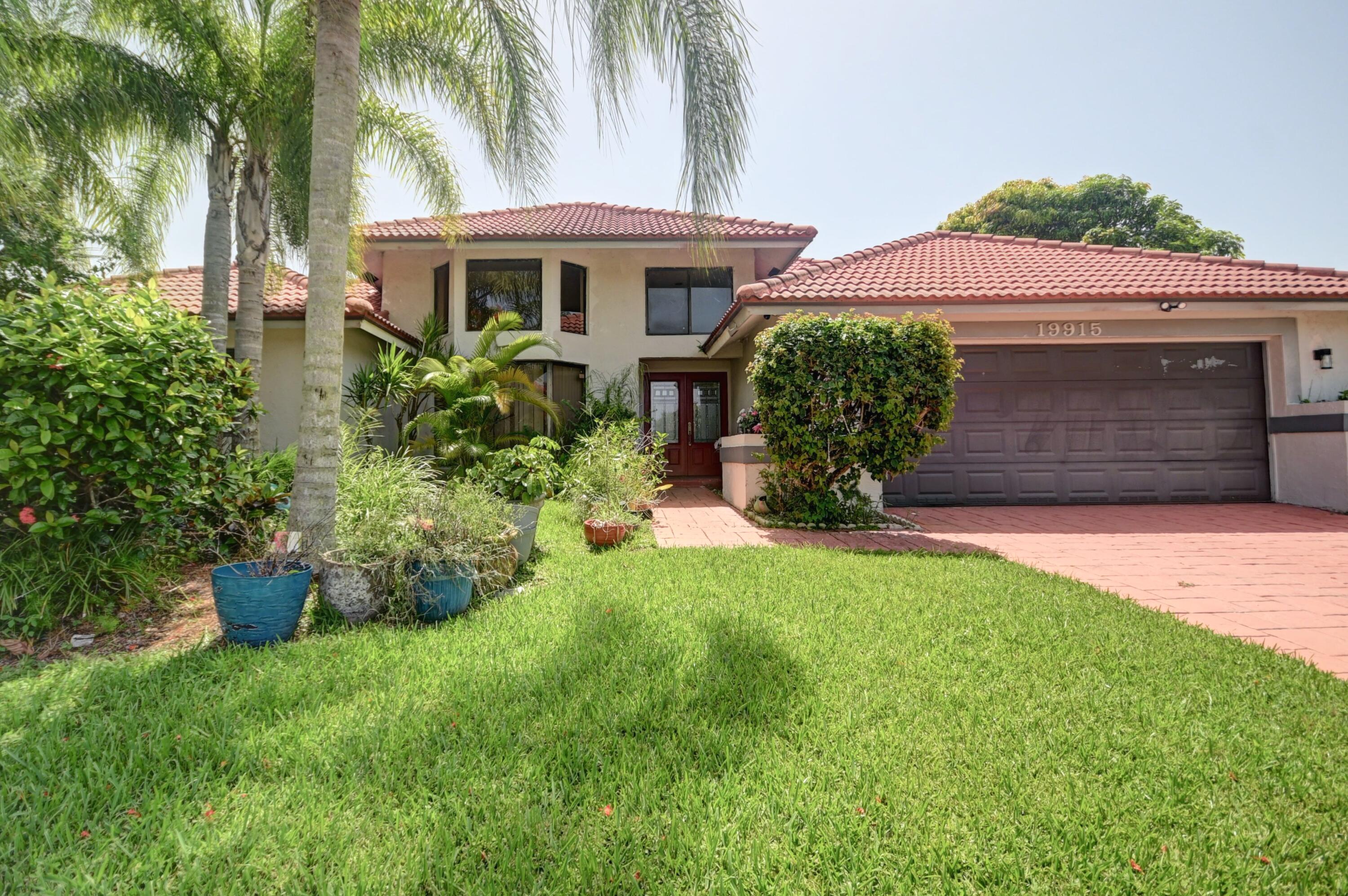 Foto de propiedad en 19915 Back 9 Drive, Boca Raton, FL 33498 Boca Raton con MLS# 