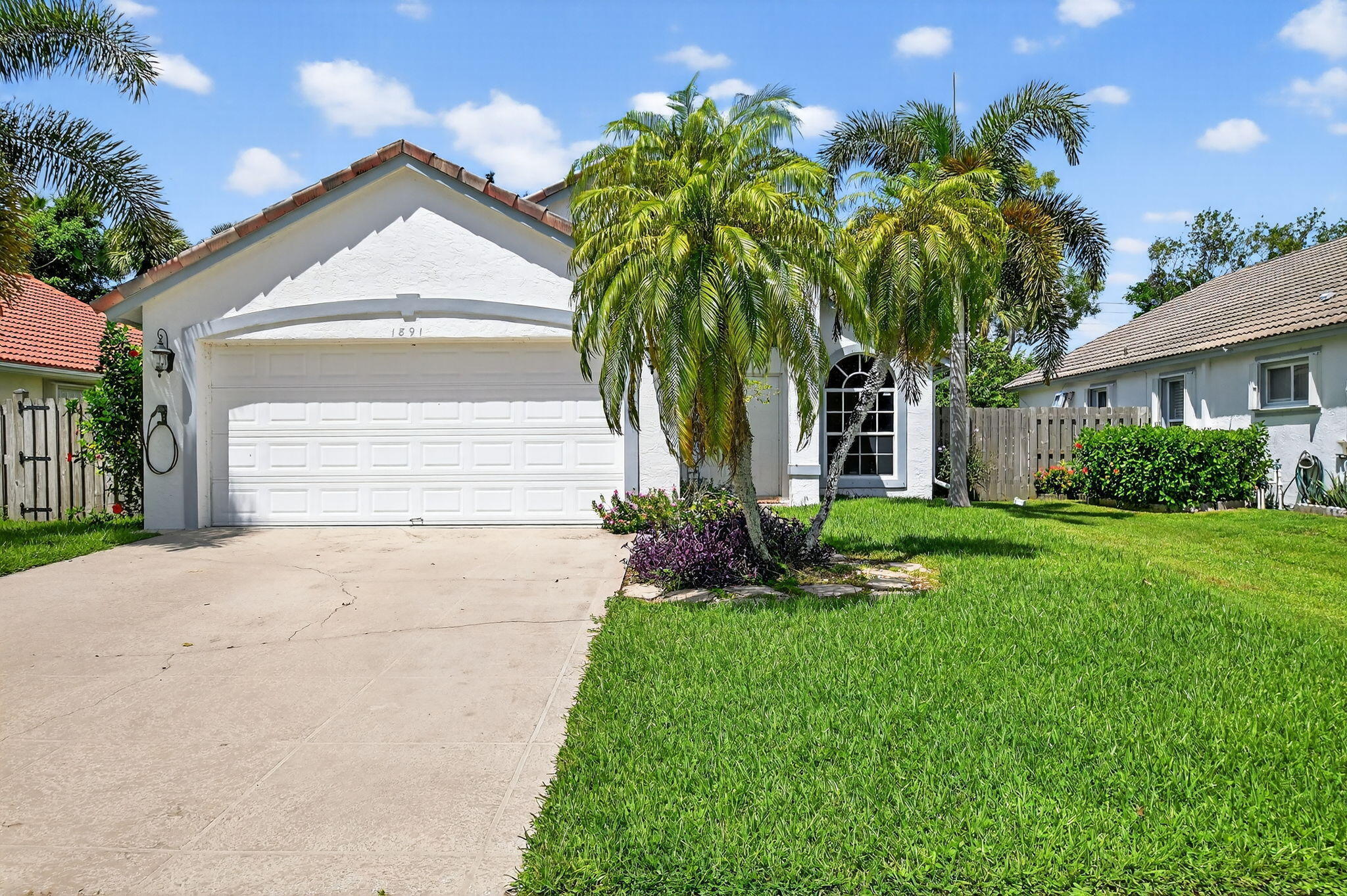 Foto de propiedad en 1891 Oak Berry Circle, Wellington, FL 33414 Wellington con MLS# 