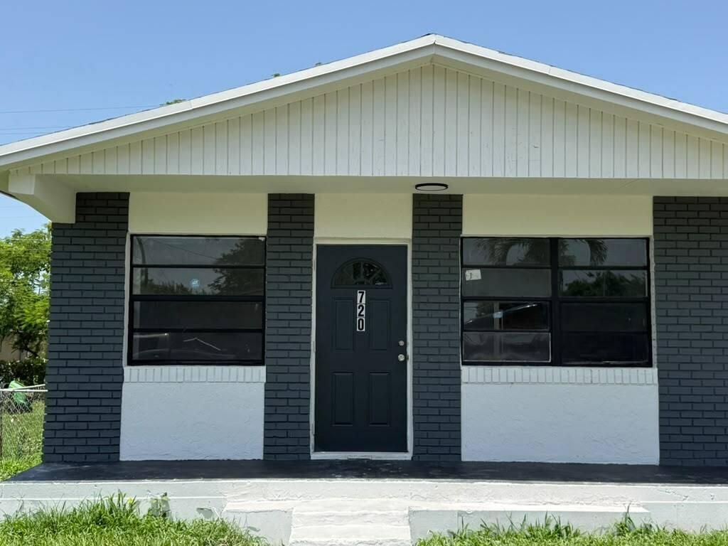 Foto de propiedad en 720 Rickey Jackson Boulevard, Pahokee, FL 33476 Pahokee con MLS# 
