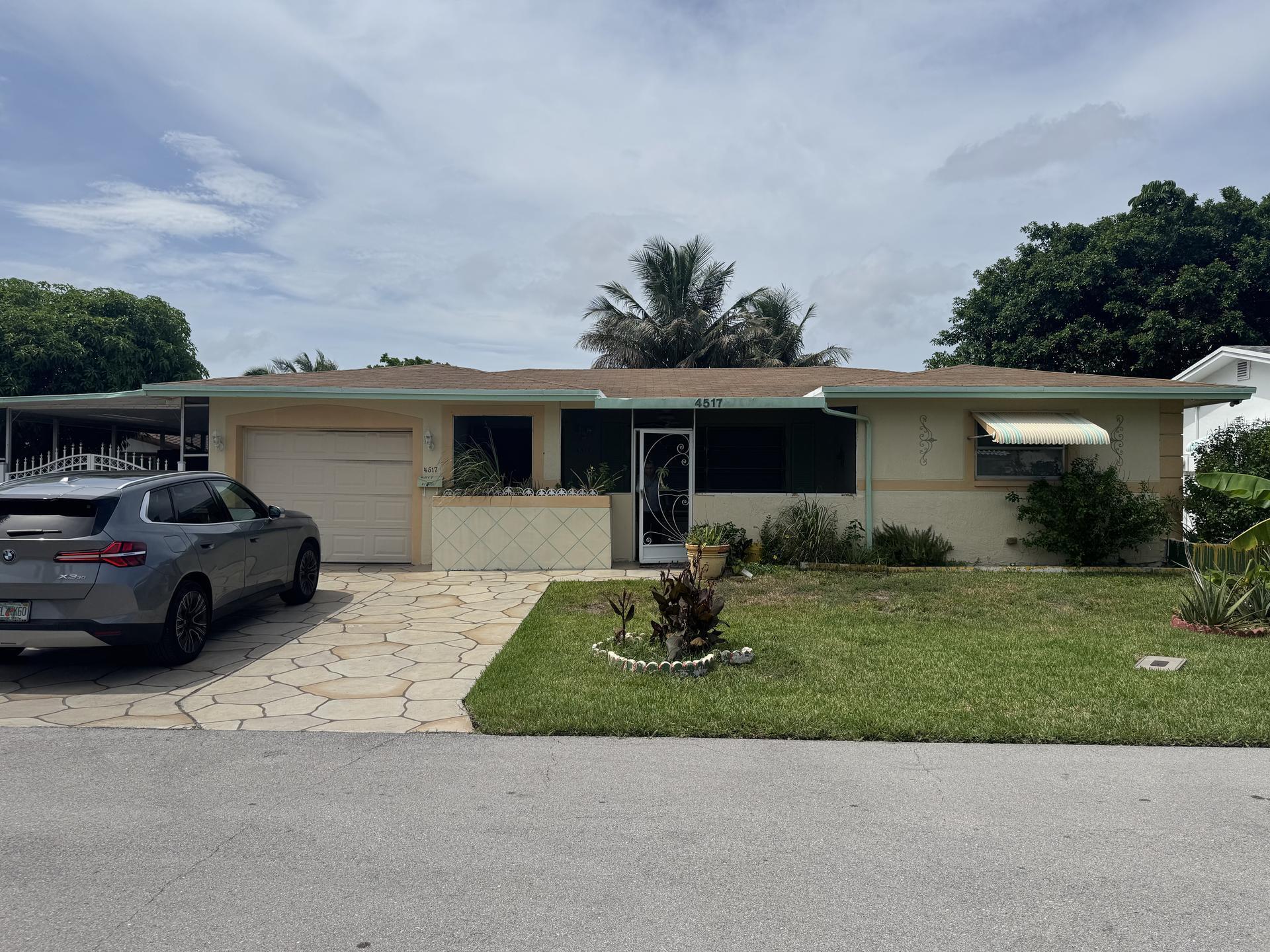 Foto de propiedad en 4517 NW 49th Court, Tamarac, FL 33319 Tamarac con MLS# 