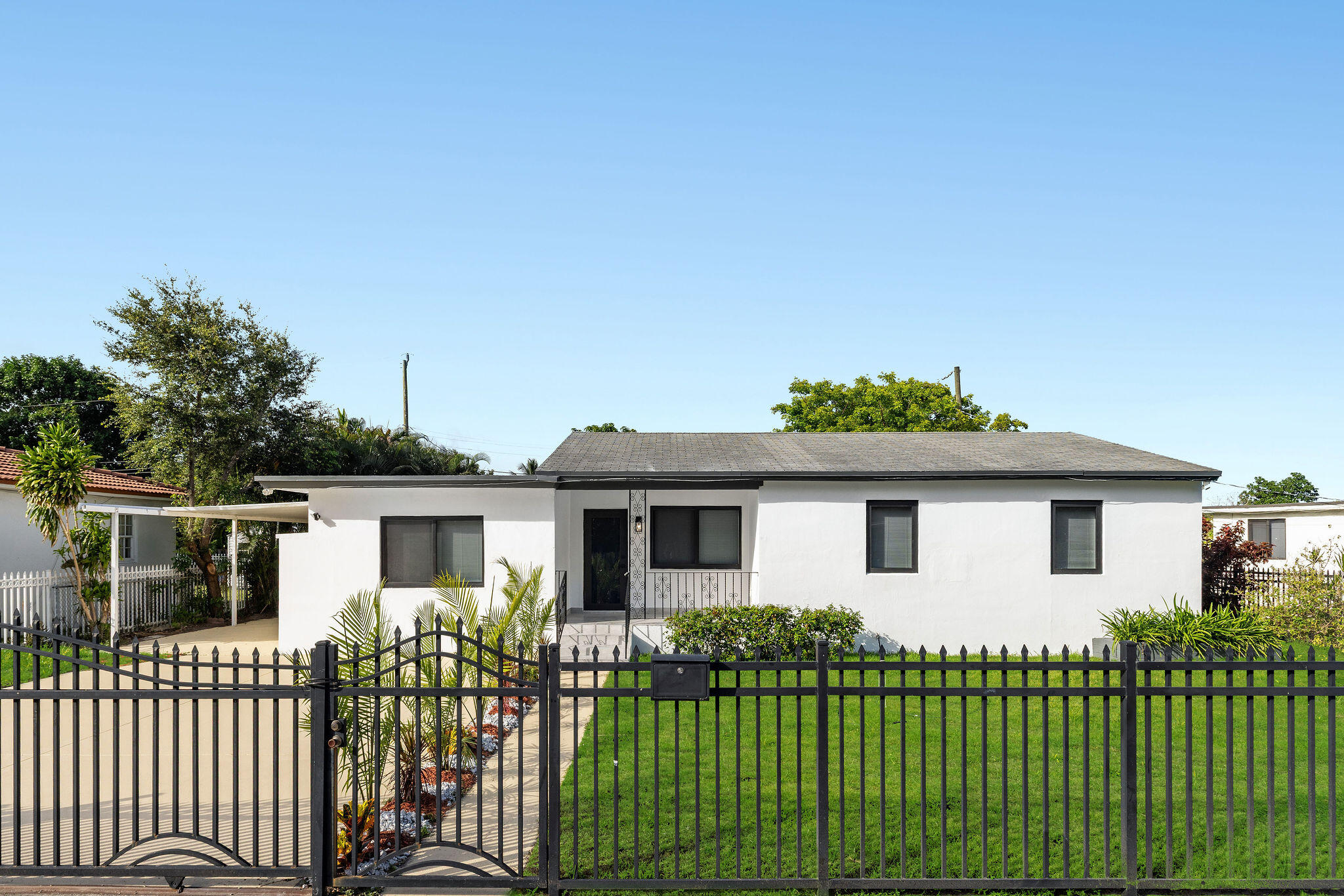 Foto de propiedad en 9001 NW 32nd Ct Road, Miami, FL 33147 Miami con MLS# 