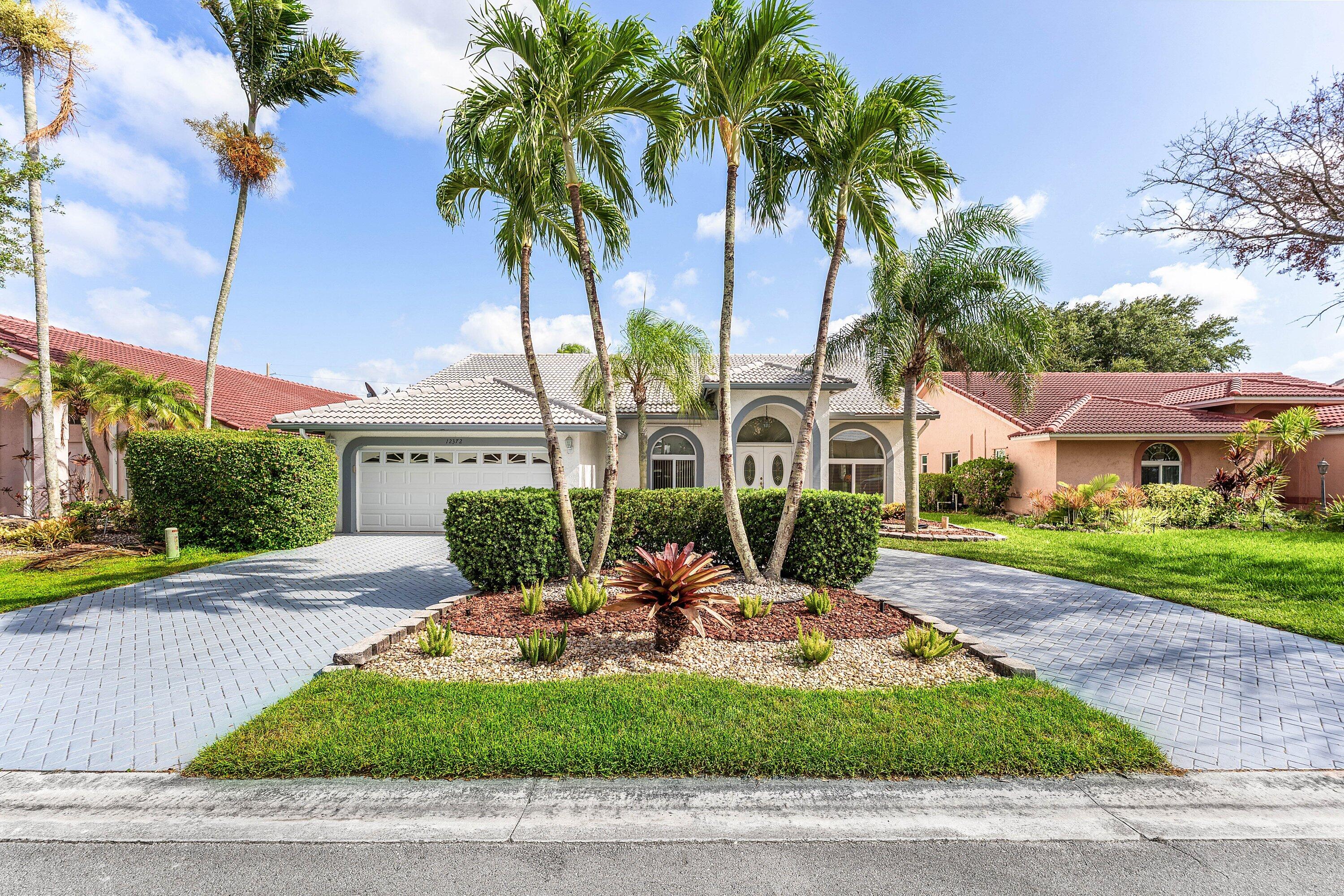Foto de propiedad en 12372 SW 1st Street, Coral Springs, FL 33071 Coral Springs con MLS# 