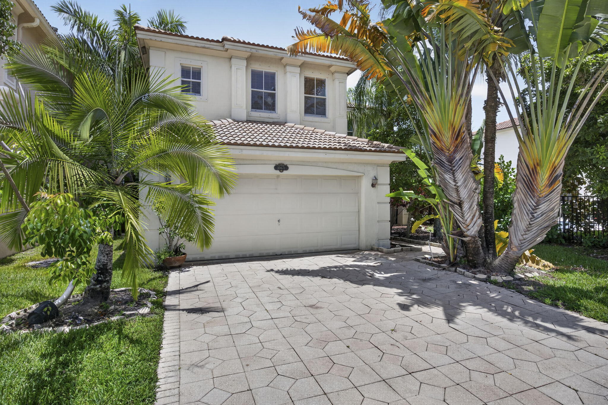 Foto de propiedad en 10671 Old Hammock Way, Wellington, FL 33414 Wellington con MLS# 
