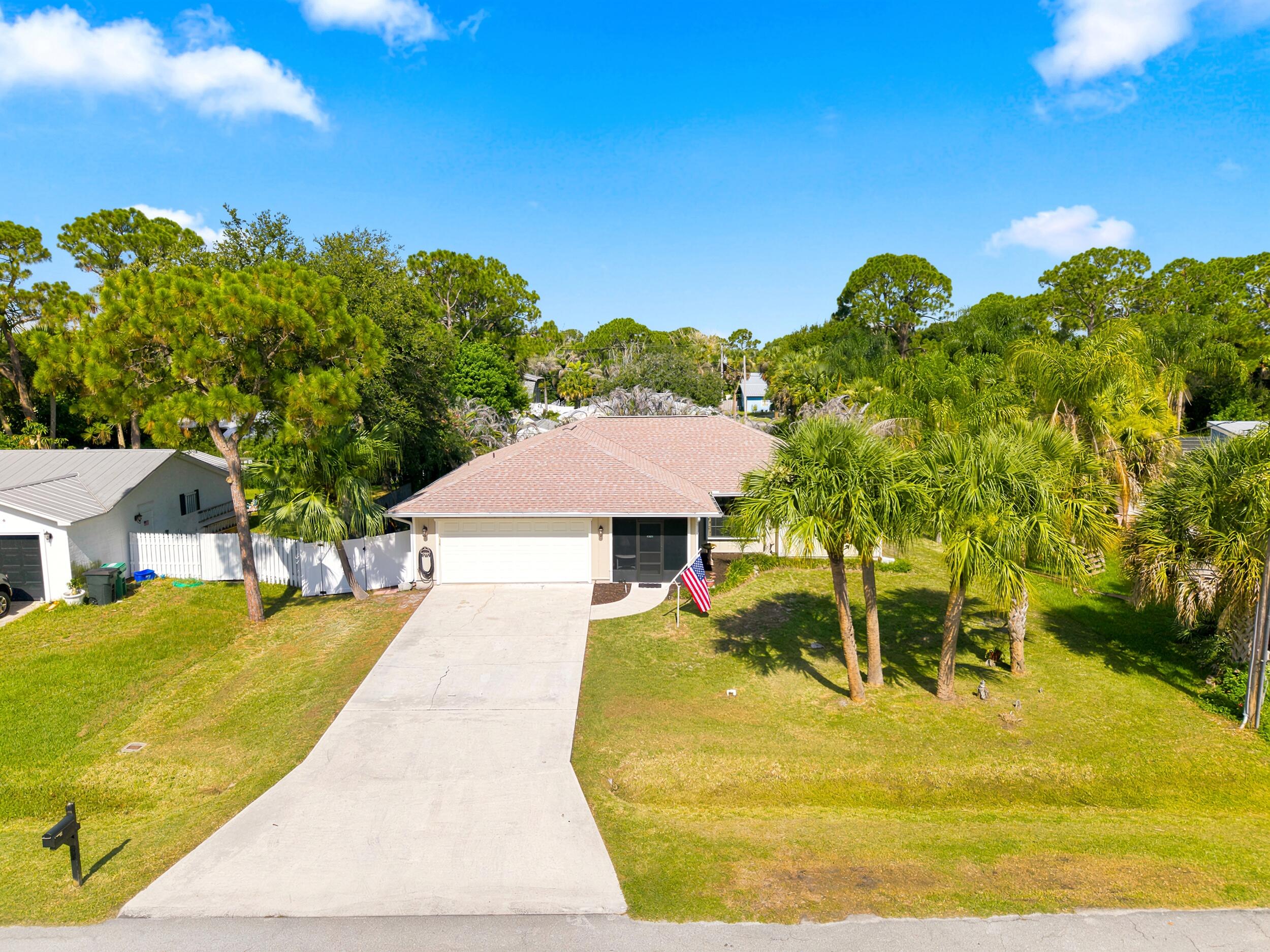 Ranch-style residence featuring Newer roof, an integrated garage, and a concrete driveway
