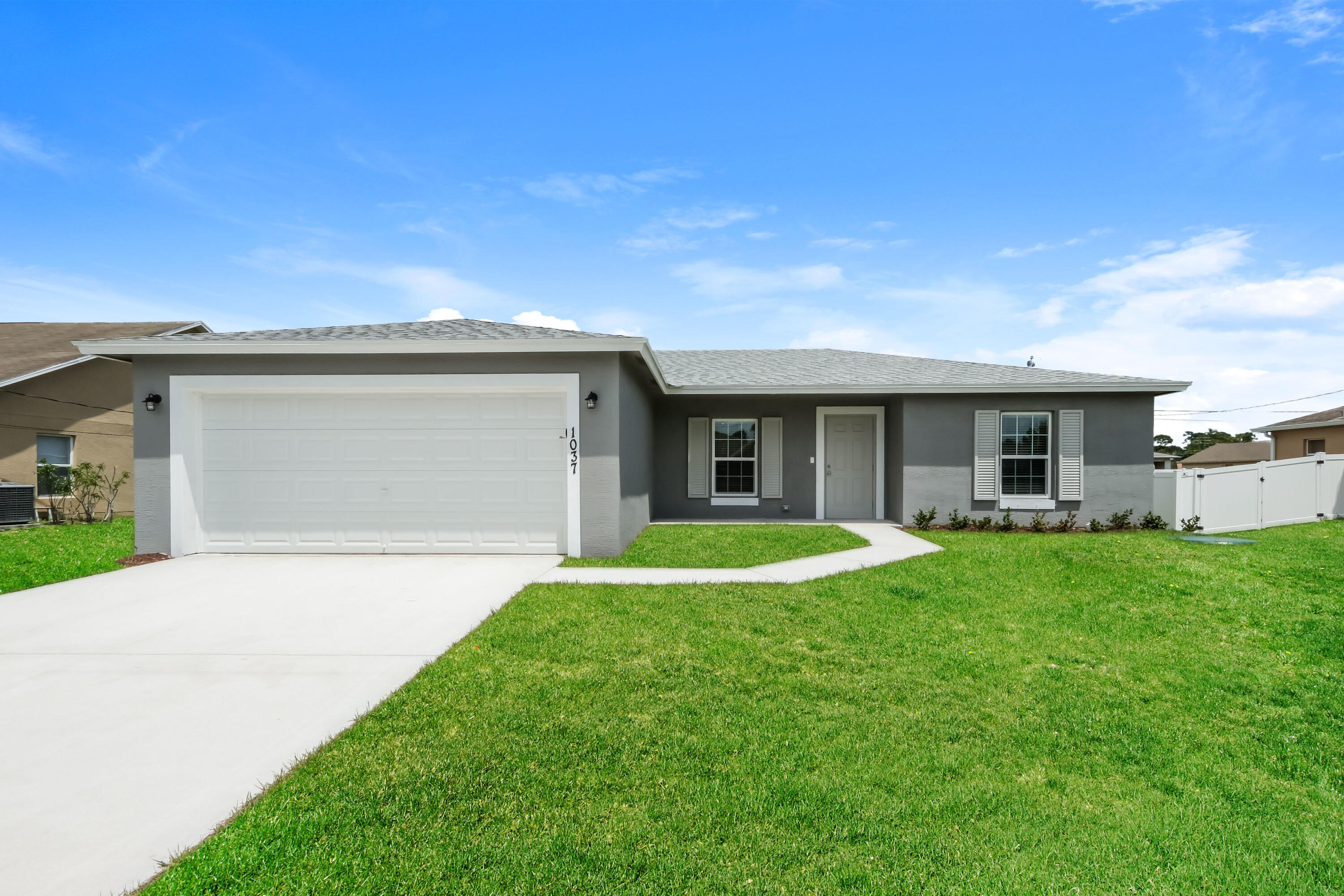 Foto de propiedad en 1037 SW SUDDER Avenue, Port St. Lucie, FL 34953 Port St. Lucie con MLS# 