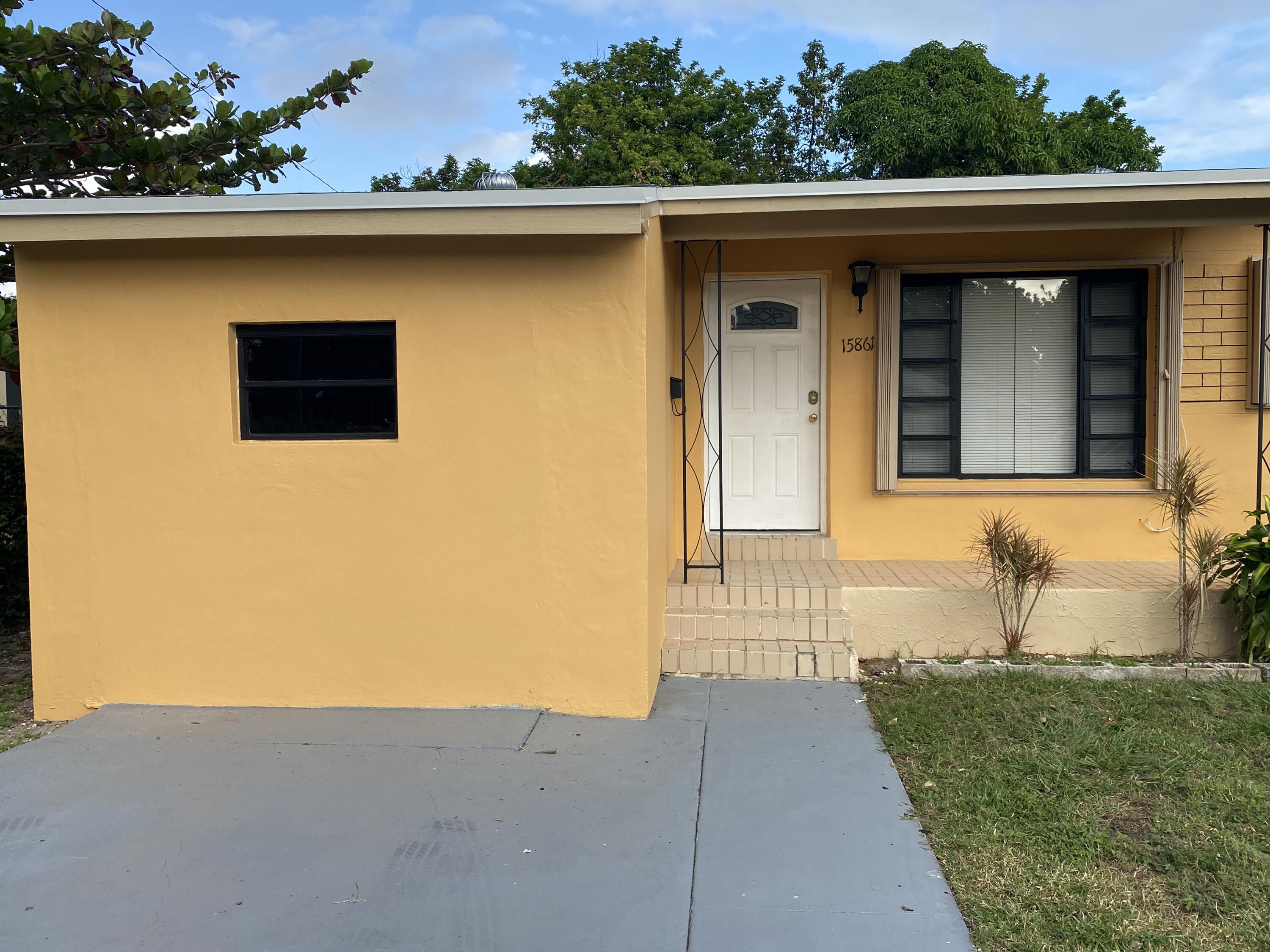Foto de propiedad en 15861 NE 14TH Court, North Miami Beach, FL 33162 North Miami Beach con MLS# 
