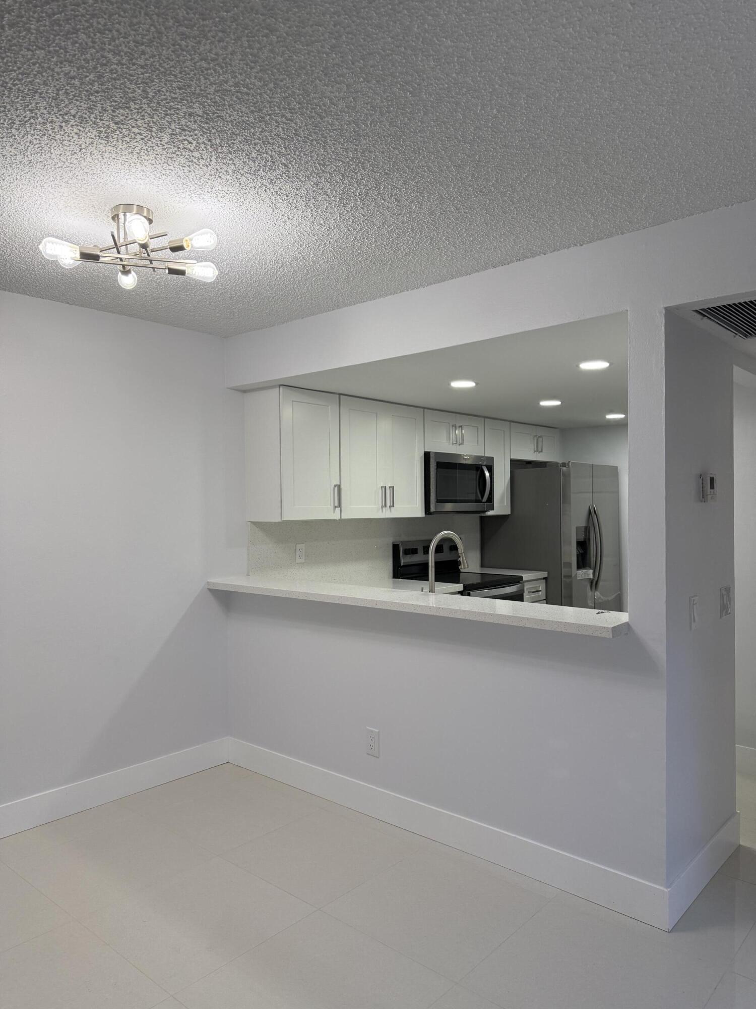 Foto de propiedad en 1041 NW 124TH Avenue 1041, Pembroke Pines, FL 33026 Pembroke Pines con MLS# 