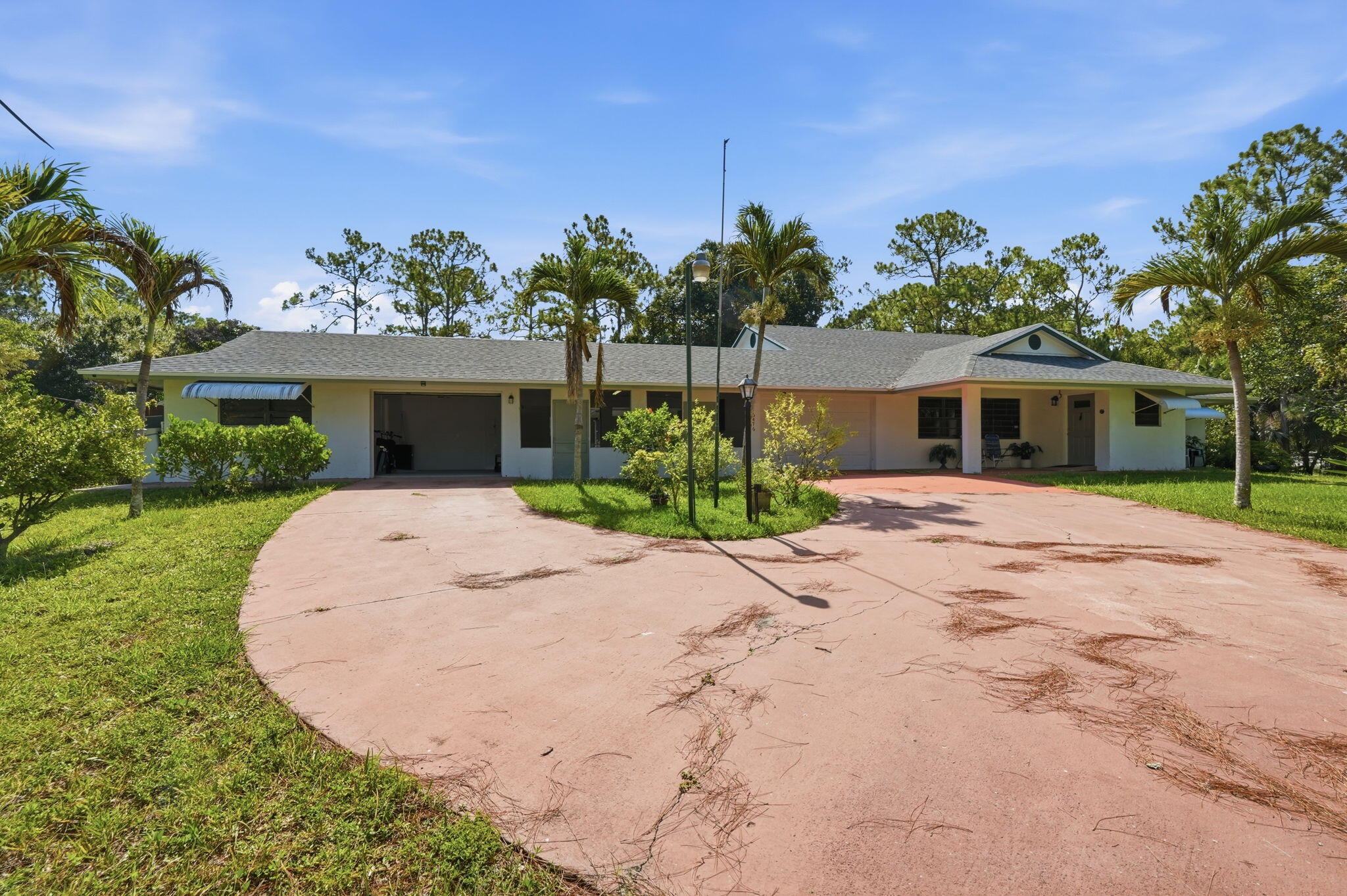 Foto de propiedad en 16476 107TH Drive N, Jupiter Farms, FL 33478 Jupiter Farms con MLS# 