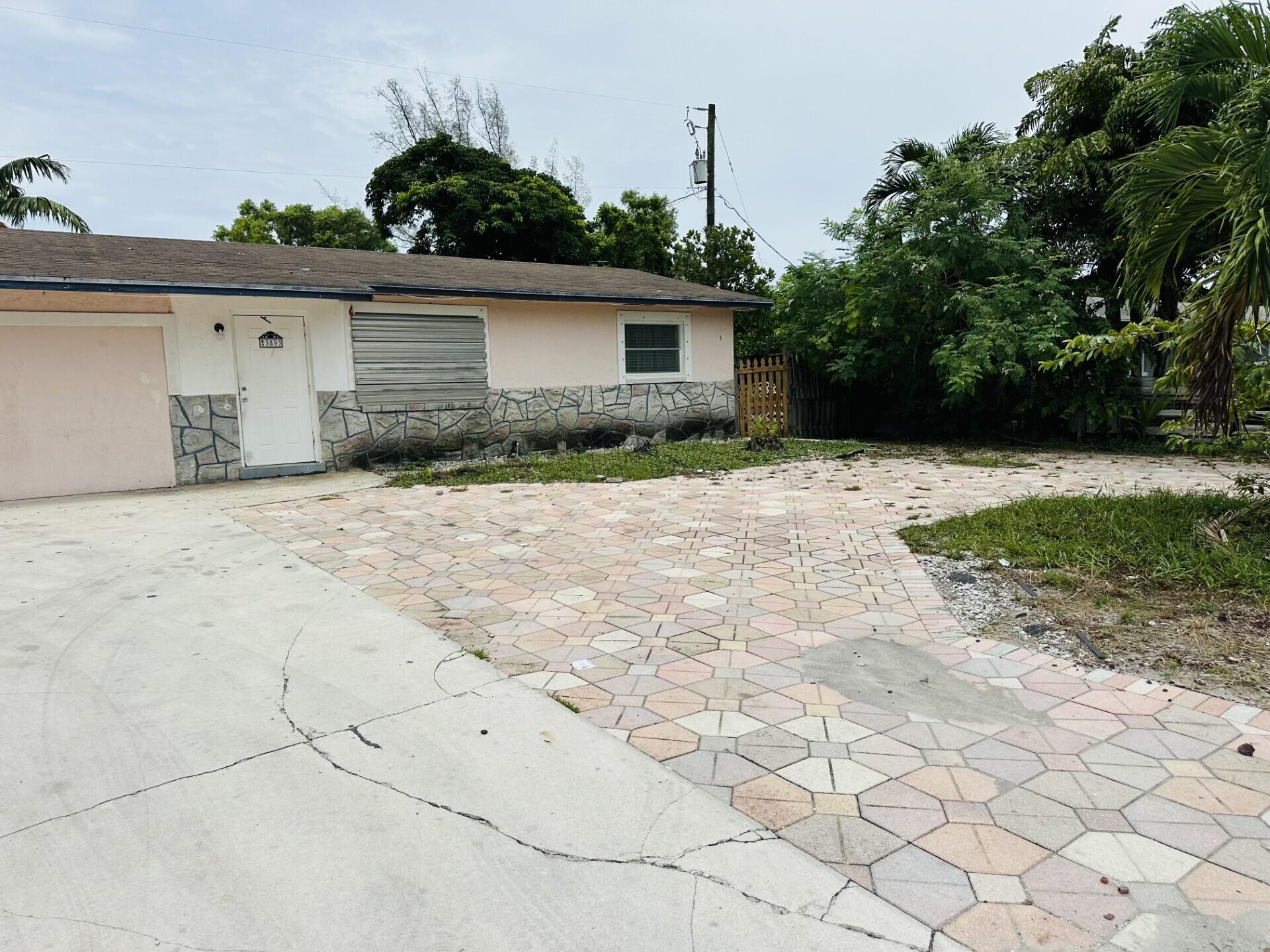 Foto de propiedad en 3893 Allison Court, Lake Worth, FL 33461 Lake Worth con MLS# 