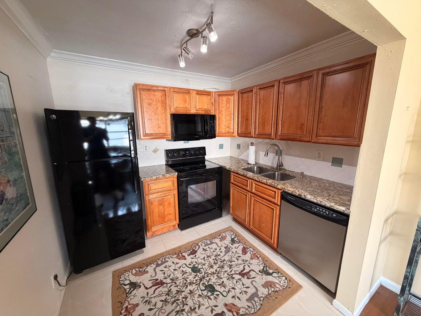 Foto de propiedad en 569 NORMANDY L, Delray Beach, FL 33484 Delray Beach con MLS# 