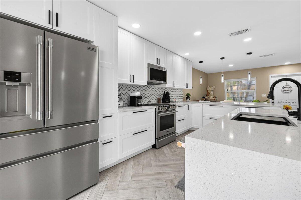 Foto de propiedad en 3367 COMMODORE Court, West Palm Beach, FL 33411 West Palm Beach con MLS# 