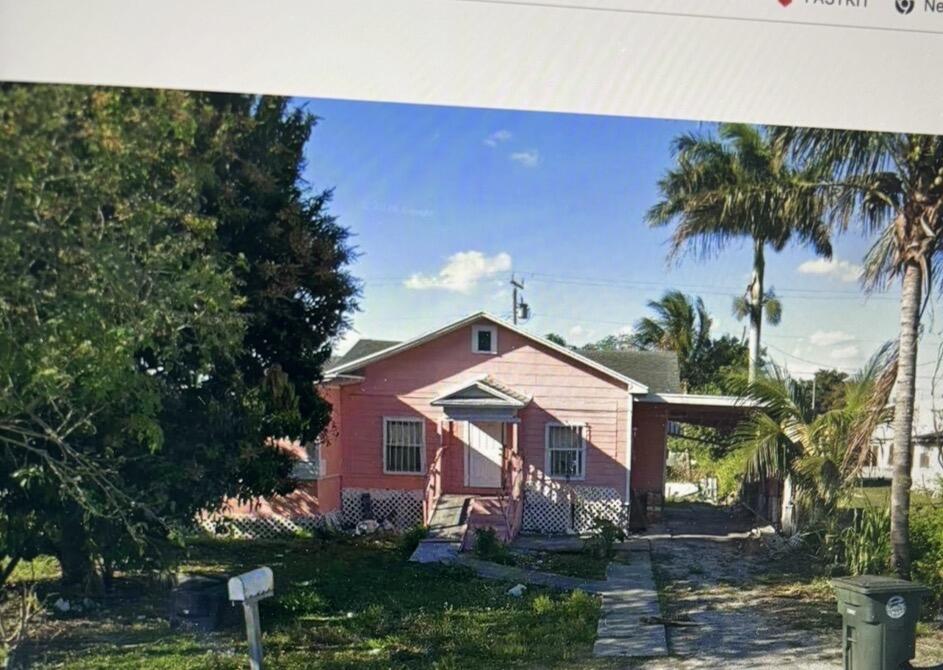 Foto de propiedad en 125 SW AVENUE C, Belle Glade, FL 33430 Belle Glade con MLS# 