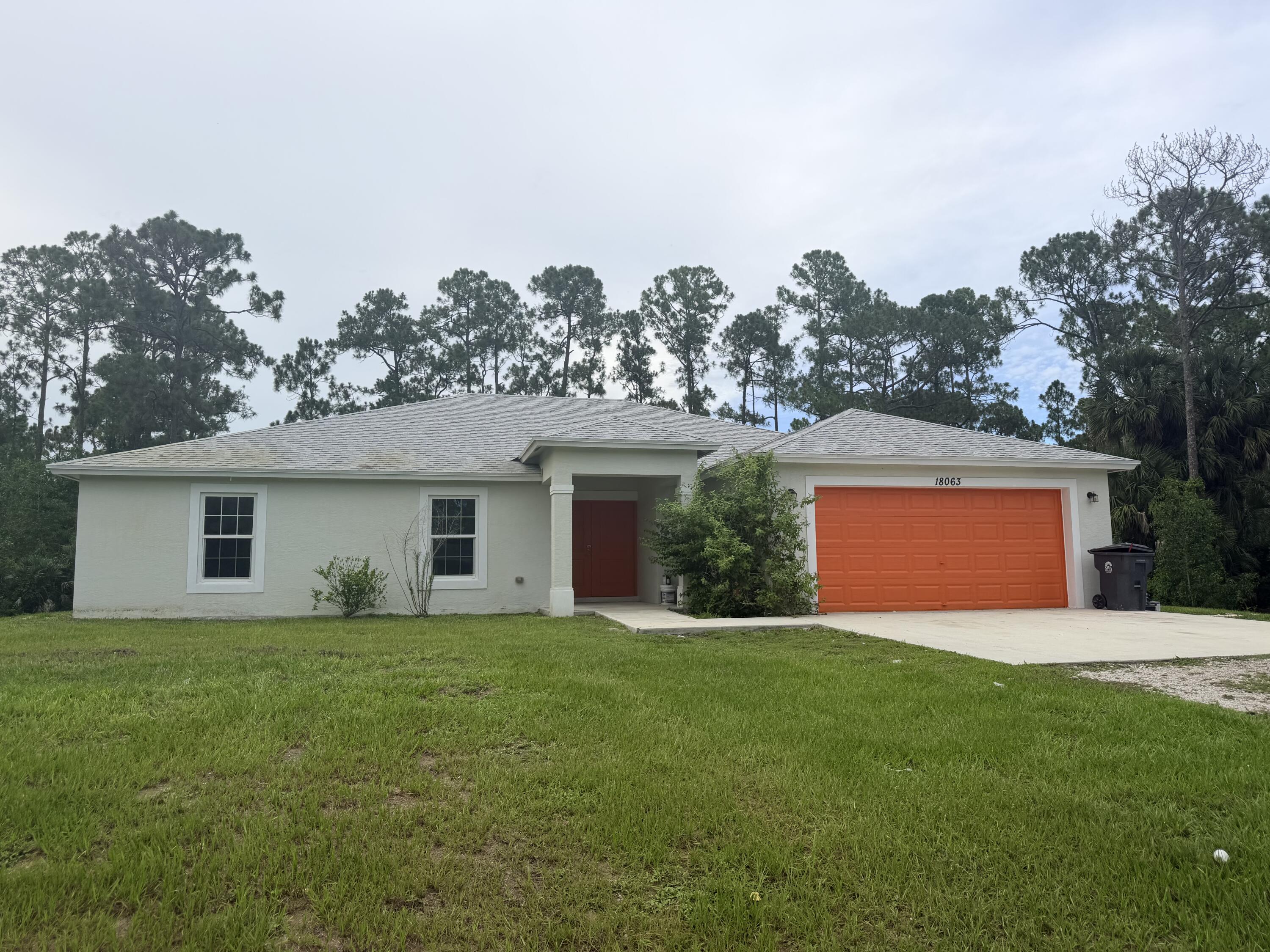 Foto de propiedad en 18063 MURCOTT Boulevard, The Acreage, FL 33470 The Acreage con MLS# 