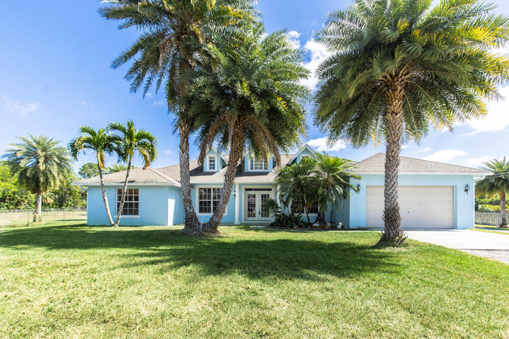 Foto de propiedad en 15288 76TH Road N, The Acreage, FL 33470 The Acreage con MLS# 