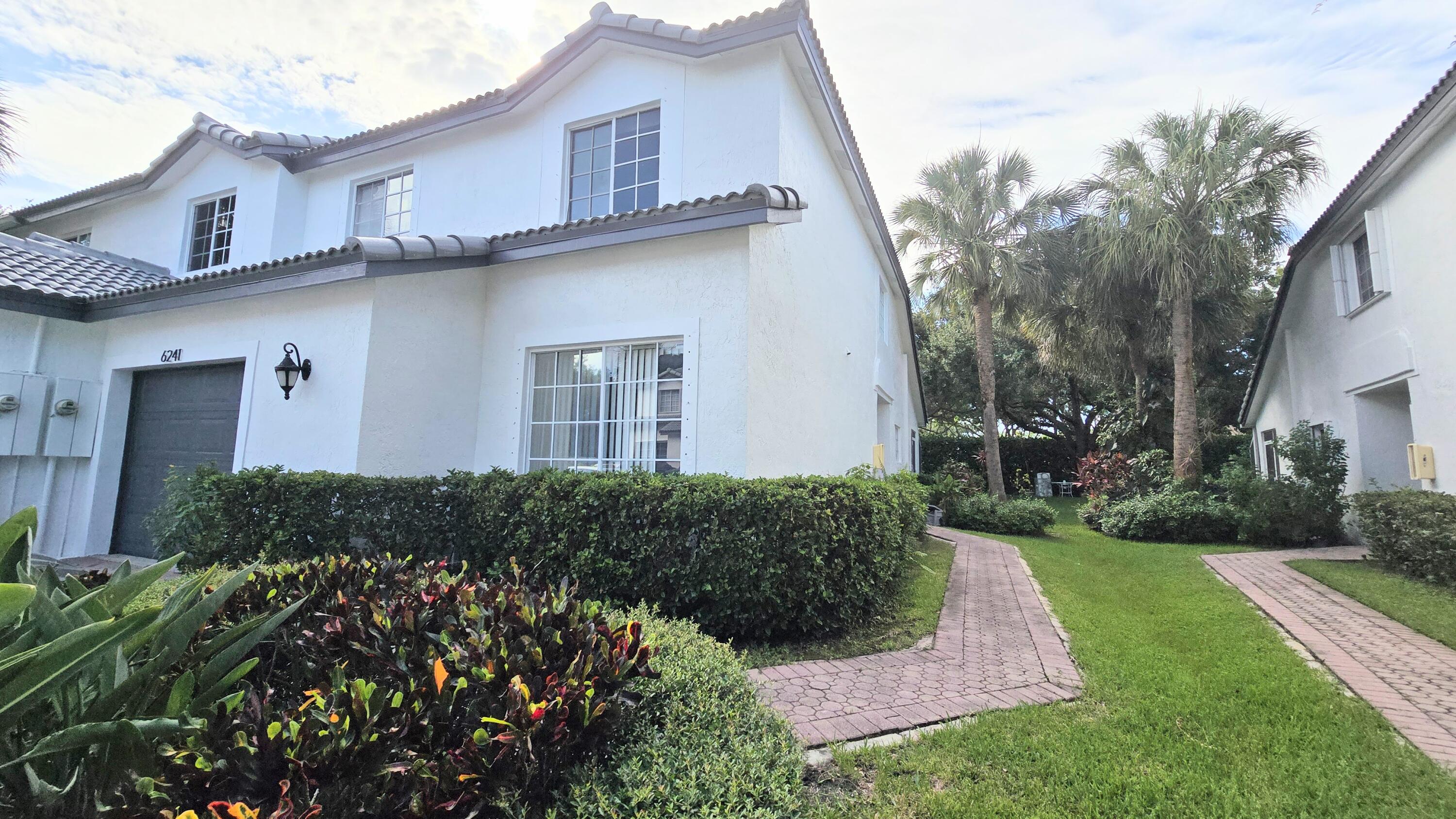 Foto de propiedad en 6241 NW 74th Court, Parkland, FL 33067 Parkland con MLS# 