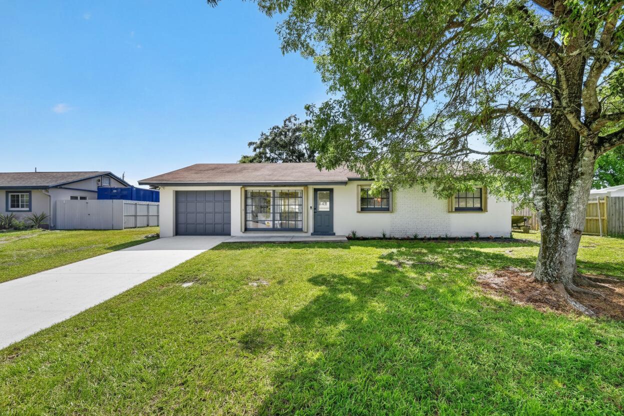Foto de propiedad en 432 W Shadyside Circle, West Palm Beach, FL 33415 West Palm Beach con MLS# 