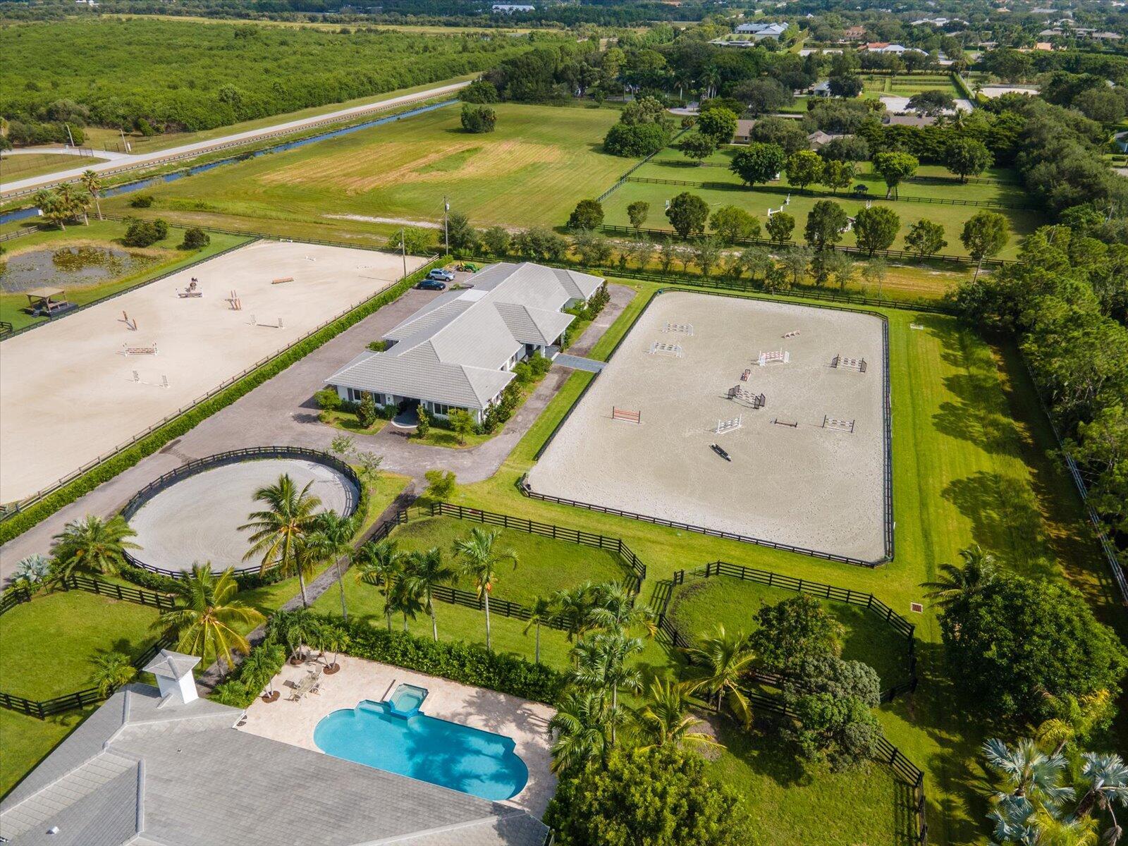 Foto de propiedad en 15691 Sunnyland Lane, Wellington, FL 33414 Wellington con MLS# 