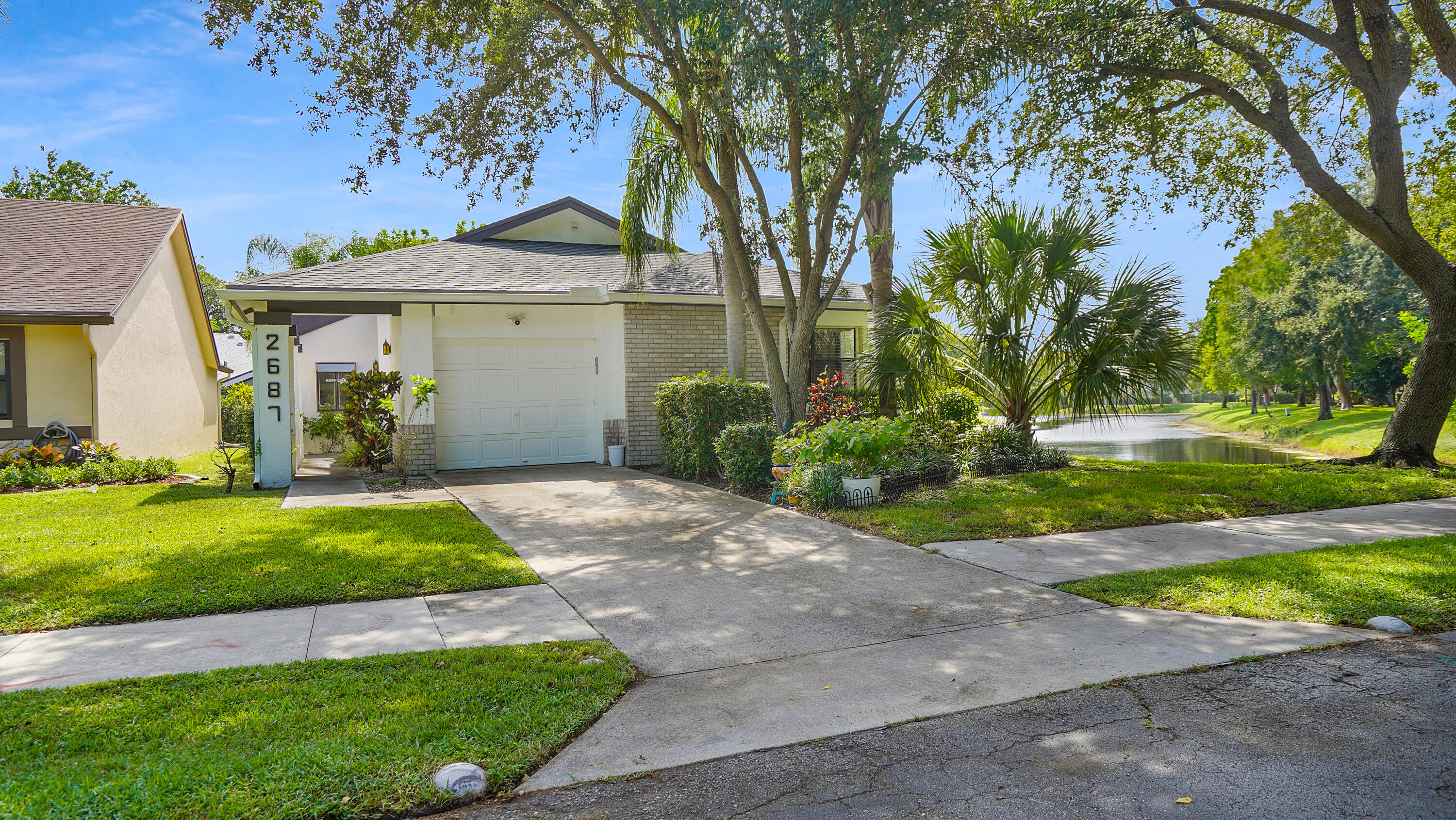 Foto de propiedad en 2687 BLUE SAGE Avenue, Coconut Creek, FL 33063 Coconut Creek con MLS# 
