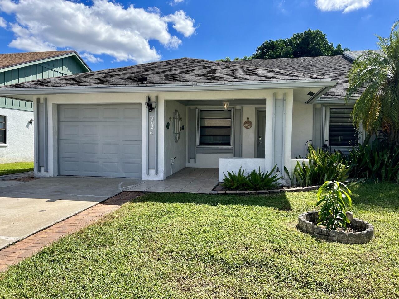 Foto de propiedad en 12026 Suellen Circle, Wellington, FL 33414 Wellington con MLS# 