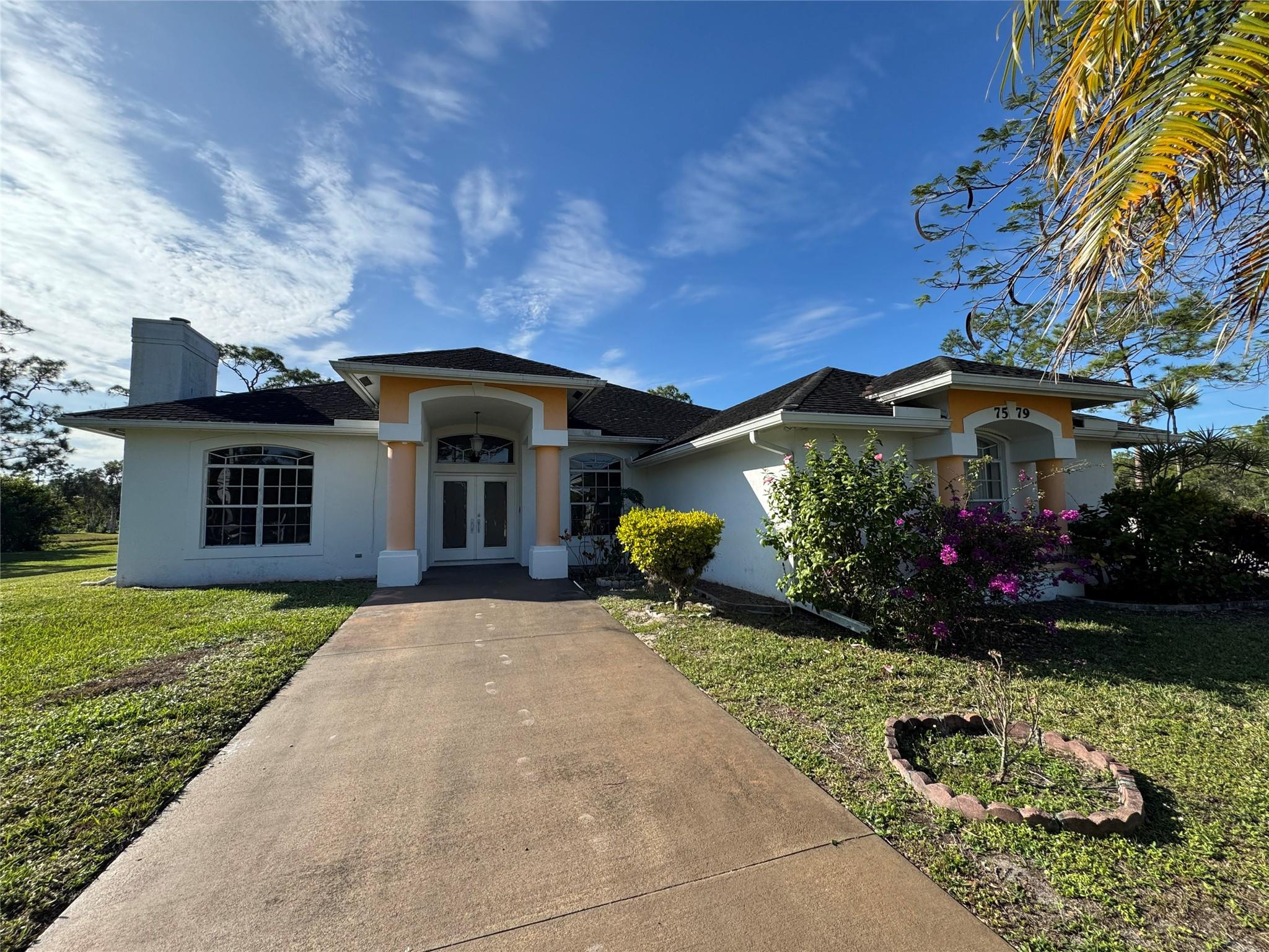 Foto de propiedad en 7579 Coconut Boulevard, West Palm Beach, FL 33412 West Palm Beach con MLS# 