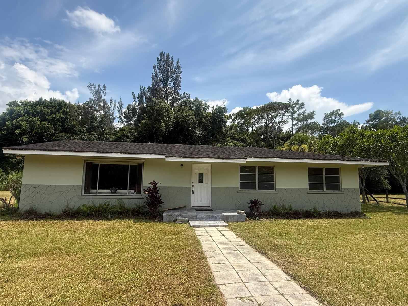 Foto de propiedad en 13886 N 22ND Road N, Loxahatchee Groves, FL 33470 Loxahatchee Groves con MLS# 
