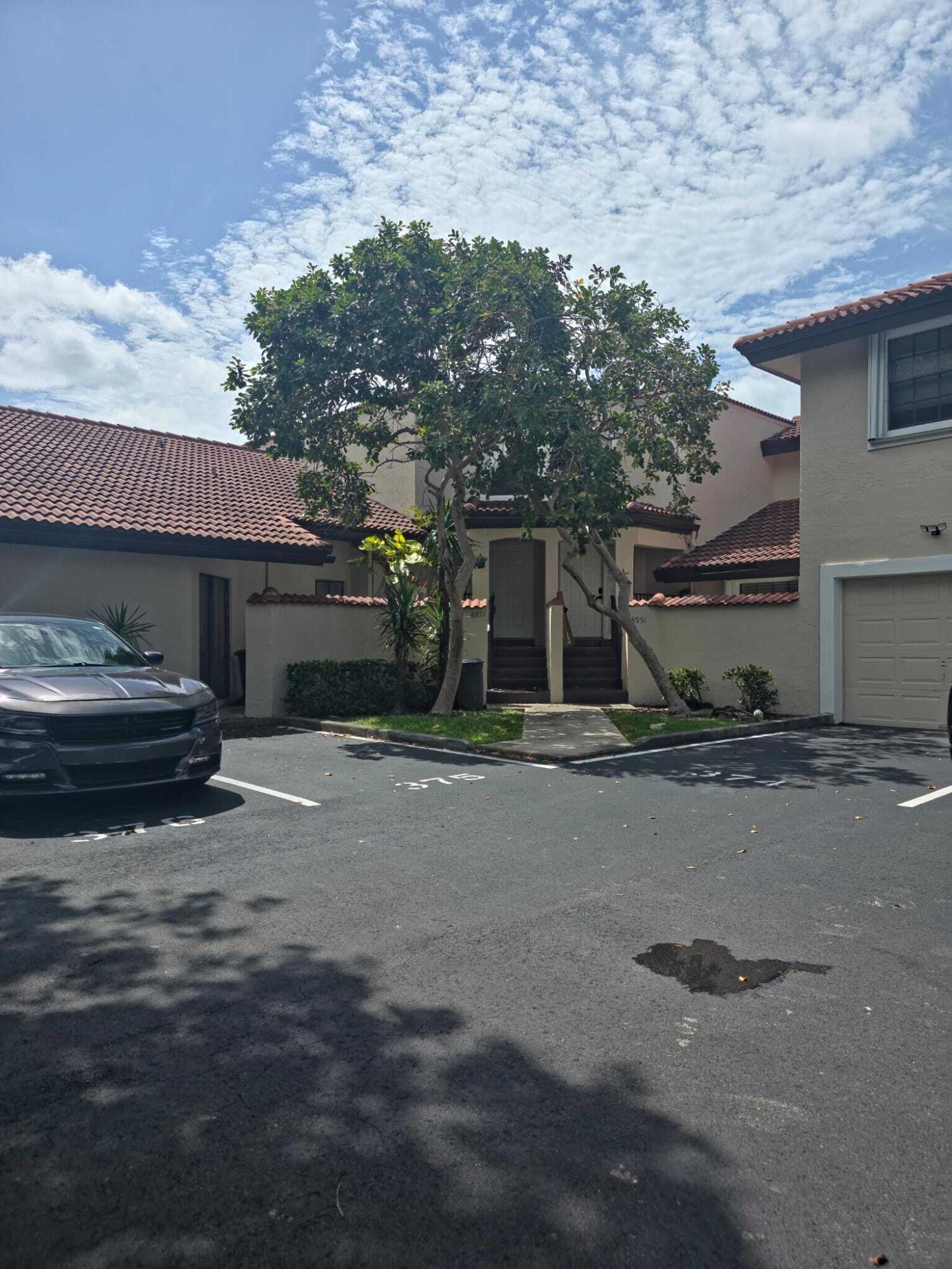 Foto de propiedad en 8953 W SUNRISE Boulevard 8953, Plantation, FL 33322 Plantation con MLS# 